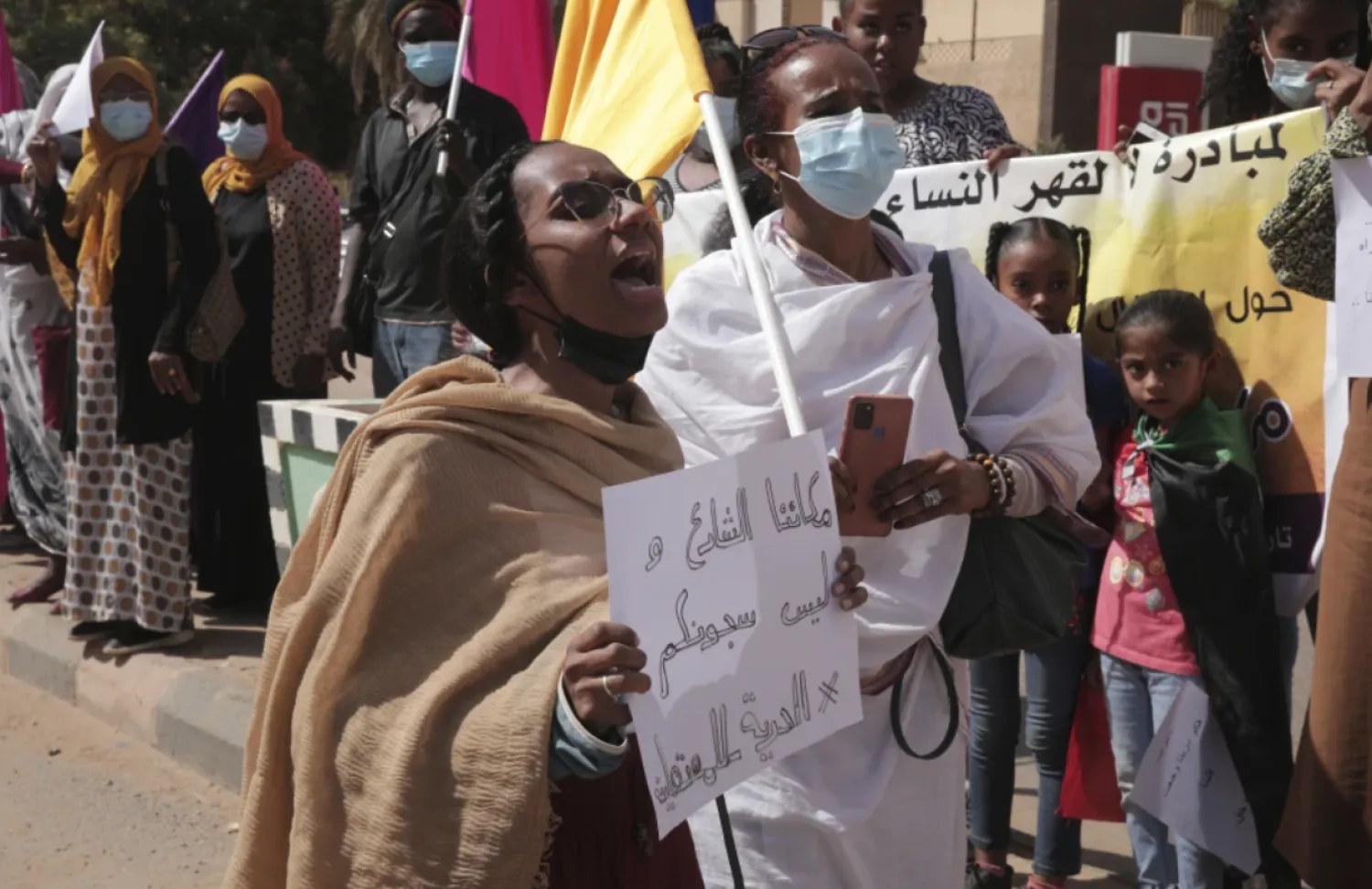 FILE - Women chant slogans protesting violence against women and demanding the release of all detainees before the UN rights office in Khartoum, Sudan, Feb. 2, 2022. AP

