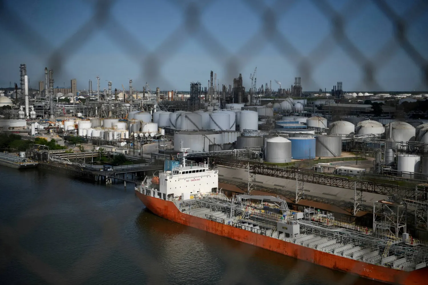 FILE PHOTO: The Houston Ship Channel and adjacent refineries, part of the Port of Houston, are seen in Houston, Texas, US, May 5, 2019.  REUTERS/Loren Elliott//File Photo