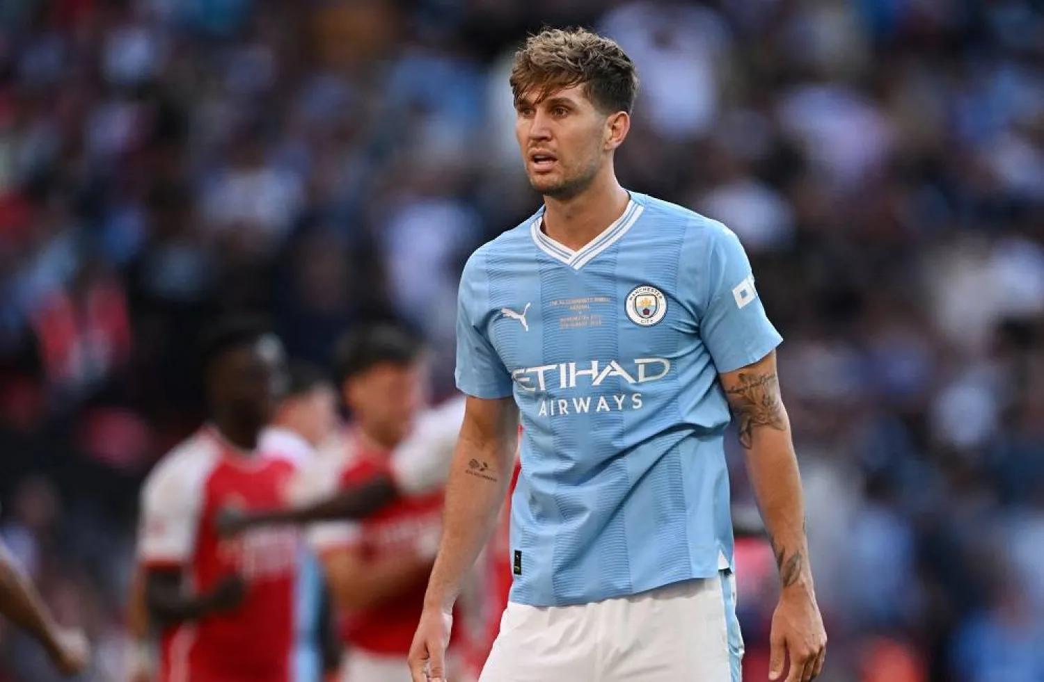 Football - Community Shield - Manchester City v Arsenal - Wembley Stadium, London, Britain - August 6, 2023 Manchester City's John Stones reacts after Arsenal's Leandro Trossard scores their first goal. (Reuters)