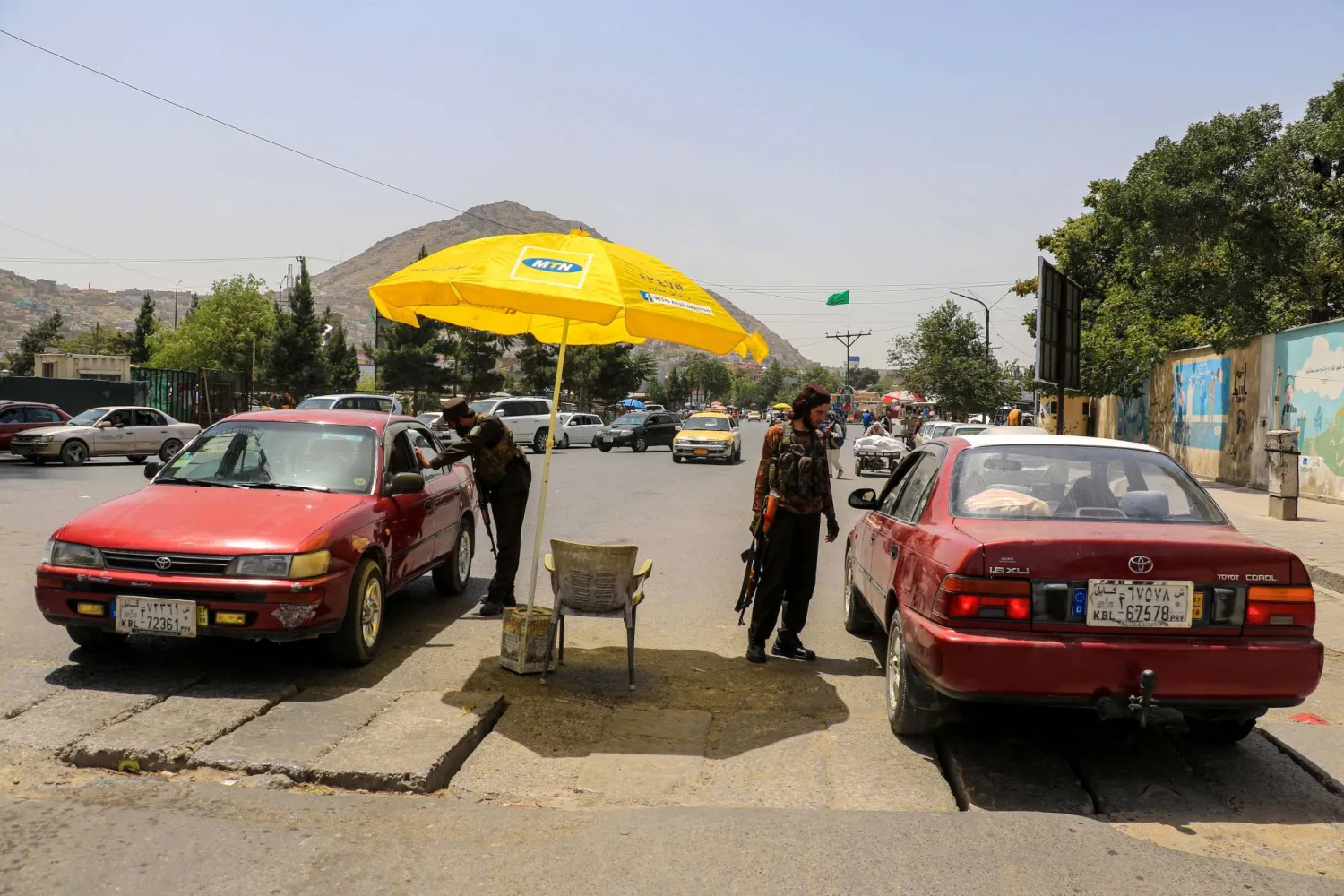 Taliban security check cars at a checkpoint in Kabul, Afghanistan, 18 August 2023.  EPA/SAMIULLAH POPAL
