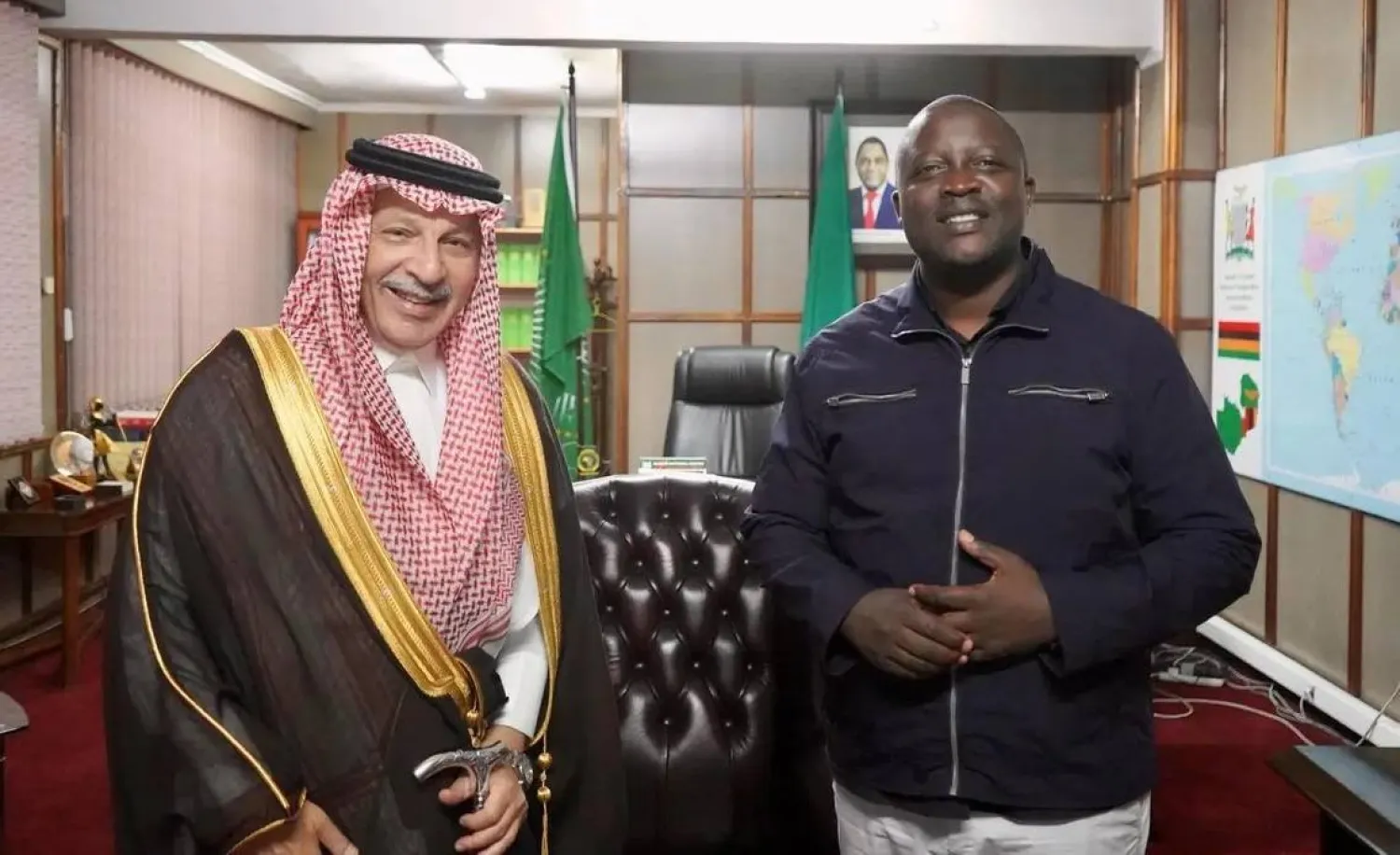 Advisor at the Royal Court Ahmed bin Abdulaziz Qattan meets with Zambian Foreign Minister Stanley Kakubo in Lusaka. (SPA) 