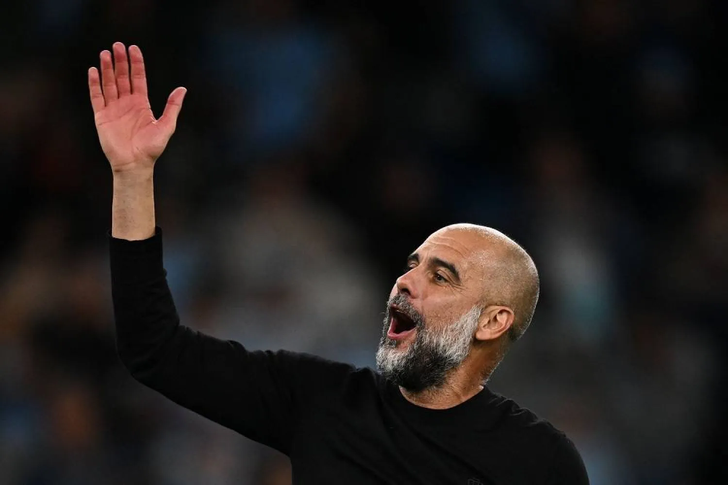 Manchester City's Spanish manager Pep Guardiola celebrates at the end of the English Premier League football match between Manchester City and Newcastle United at the Etihad Stadium in Manchester, north west England, on August 19, 2023. (AFP)