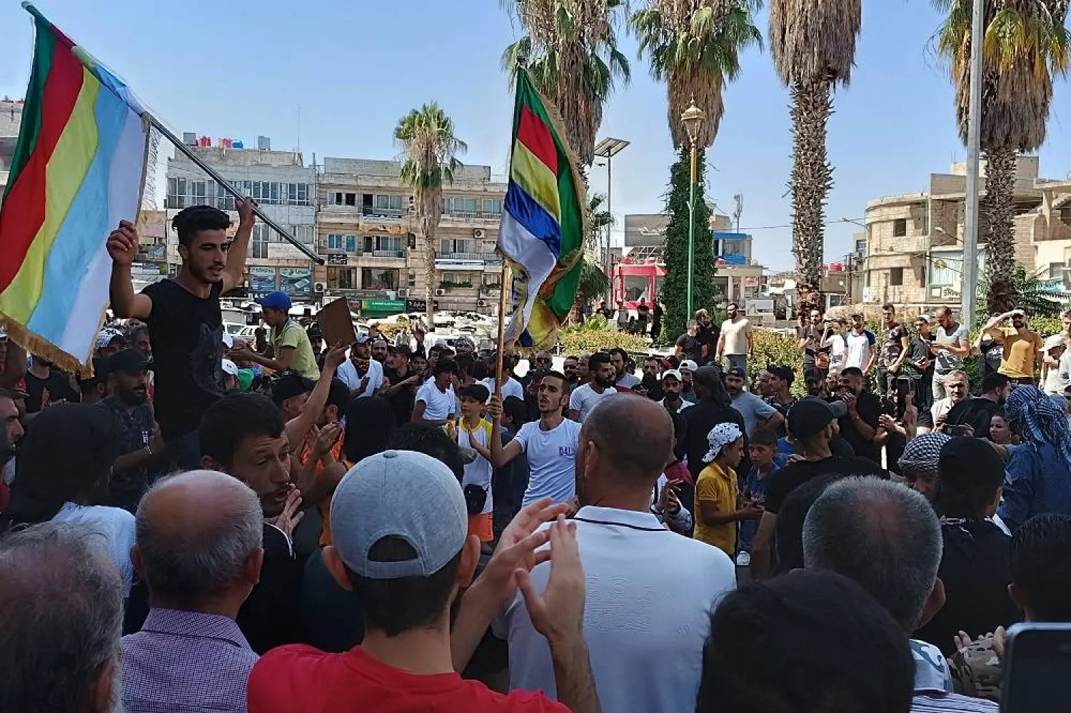 A handout picture released by the Suwayda24 news site shows people protesting in the southern Syrian city of Sweida on August 23, 2023. (Photo by Suwayda24 / AFP) 