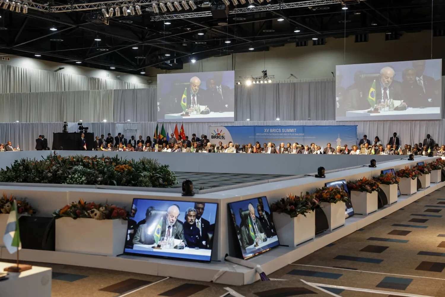General view of delegates attending a meeting during the 2023 BRICS Summit at the Sandton Convention Center in Johannesburg Thursday, Aug. 24, 2023. (Marco Longari/Pool via AP)
