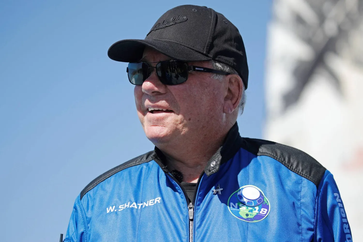 Star Trek actor William Shatner, 90, speaks to the news media after his flight with three others in a capsule powered by Blue Origin's reusable rocket engine New Shepard  on a landing pad  near Van Horn, Texas, US, October 13, 2021. REUTERS/Mike Blake