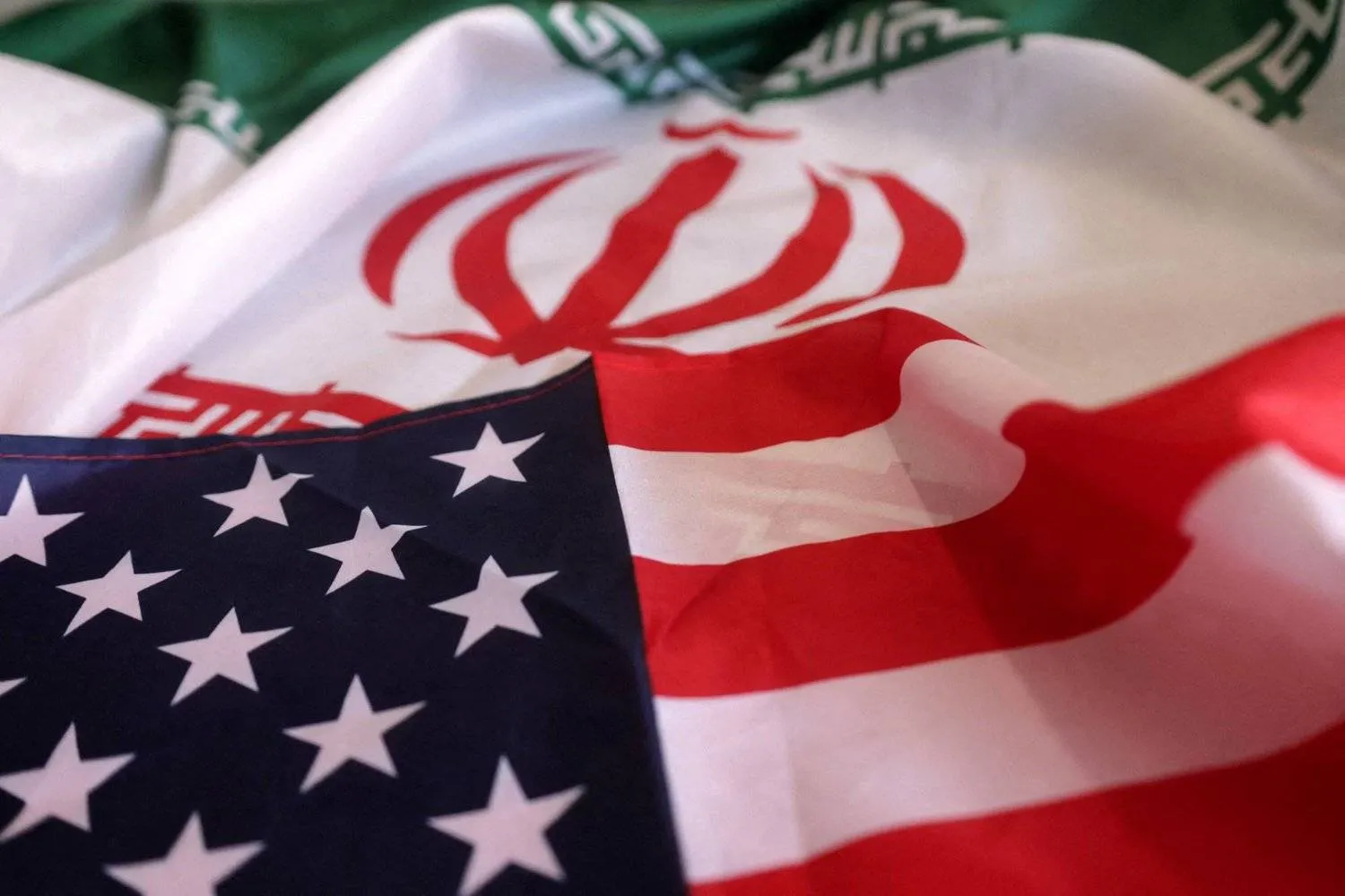 US-Iranian flags via Reuters