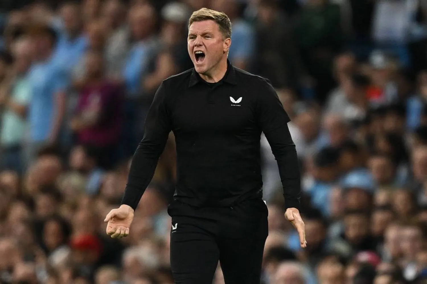 Newcastle United's English head coach Eddie Howe reacts during the English Premier League football match between Manchester City and Newcastle United at the Etihad Stadium in Manchester, northwest England, on August 19, 2023. (AFP) 