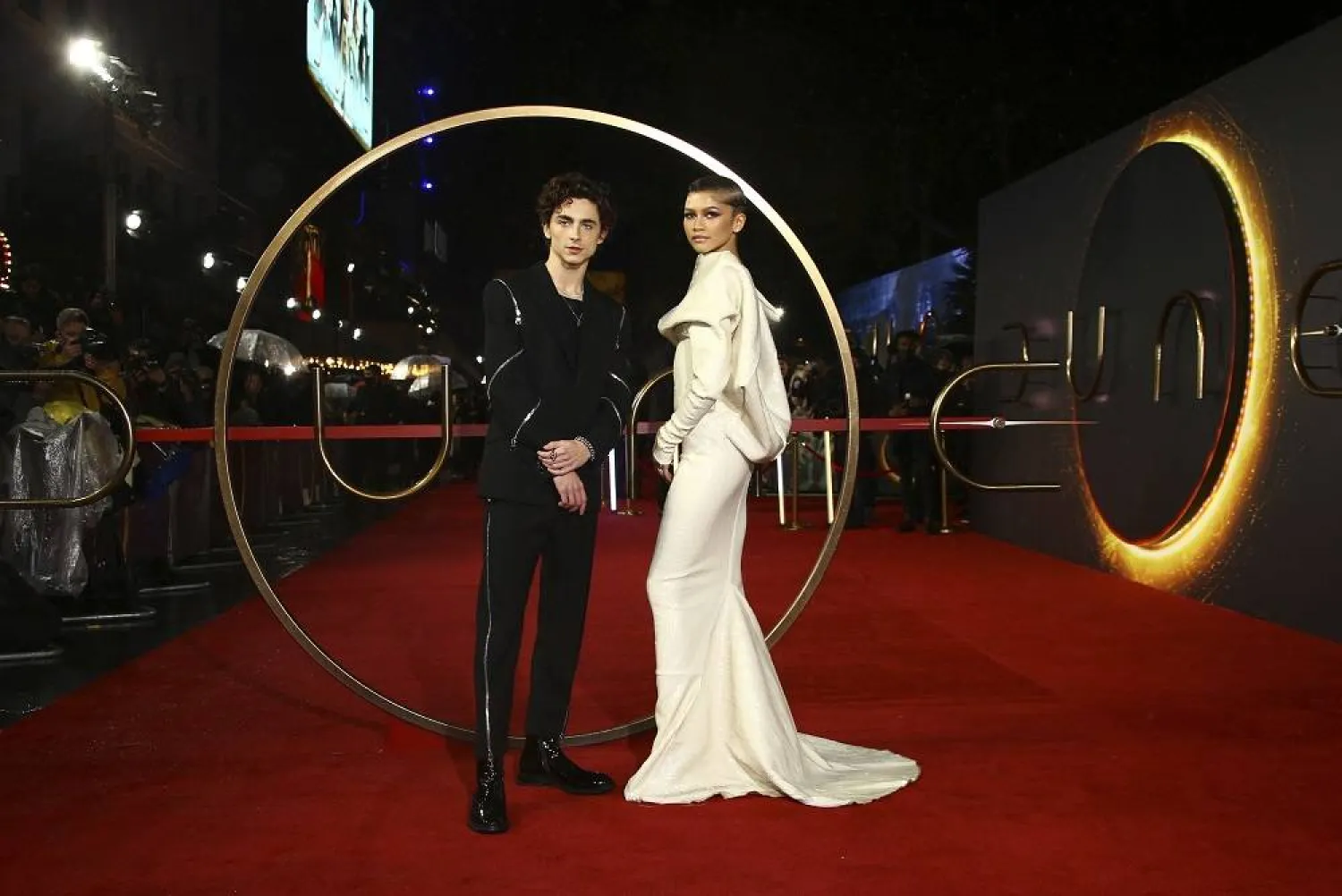 Timothee Chalamet, left, and Zendaya pose for photographers upon arrival at the premiere of the film "Dune," Oct. 18, 2021, in London. (AP) 