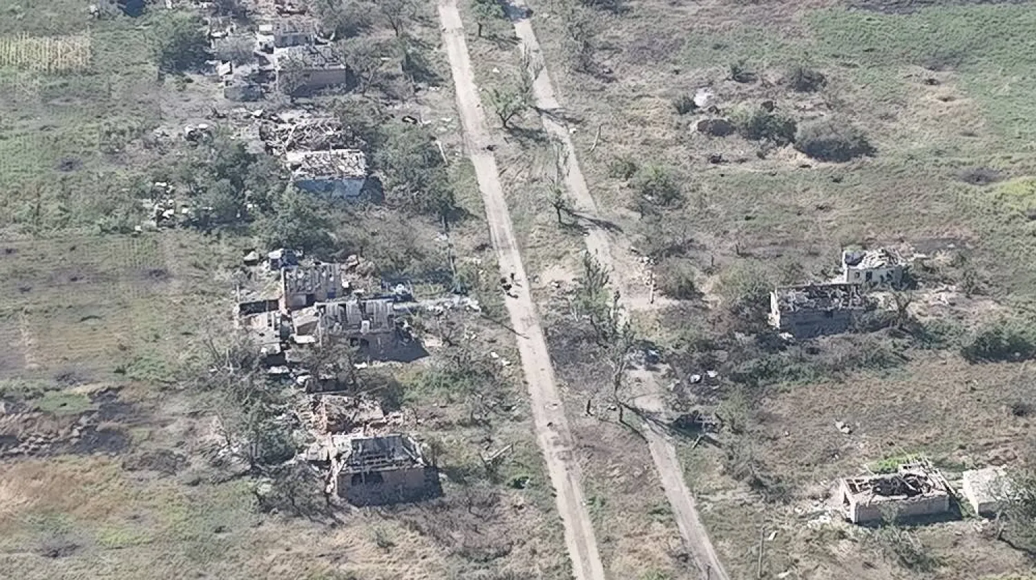 Ukrainian soldiers of the Separate Assault Battalion “Skala” enter the embattled village of Robotyne, Zaporizhzhia region, Ukraine, in this screengrab taken from a handout video released on August 25, 2023. (Separate Assault Battalion “Skala” of the Ukrainian Armed Forces/Handout via Reuters) 
