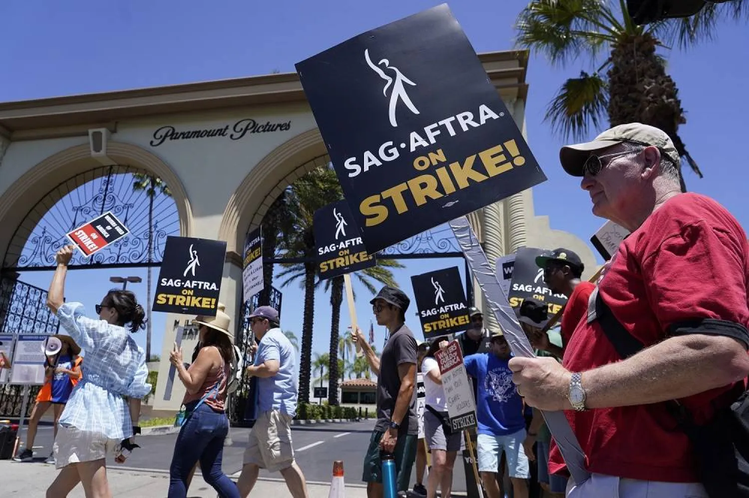 Striking writers and actors picket outside Paramount studios in Los Angeles on Friday, July 14, 2023. (AP)
