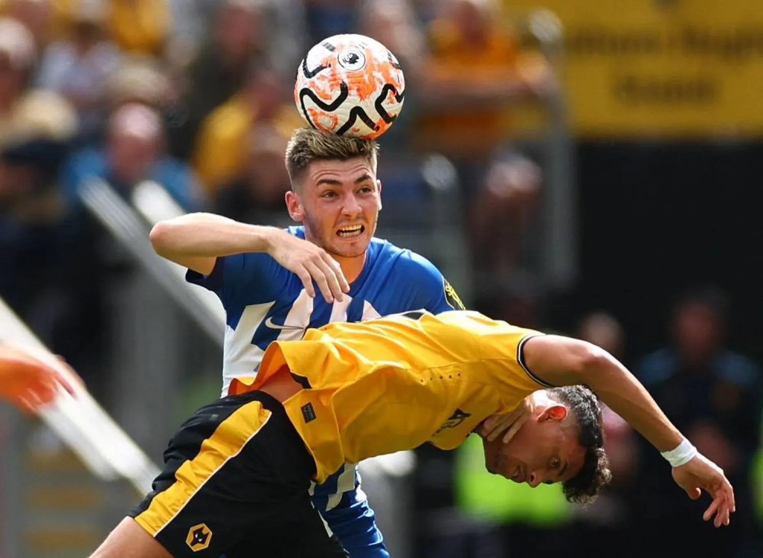 Football - Premier League - Wolverhampton Wanderers v Brighton & Hove Albion - Molineux Stadium, Wolverhampton, Britain - August 19, 2023 Brighton & Hove Albion's Billy Gilmour in action with Wolverhampton Wanderers' Matheus Nunes. (Reuters) 