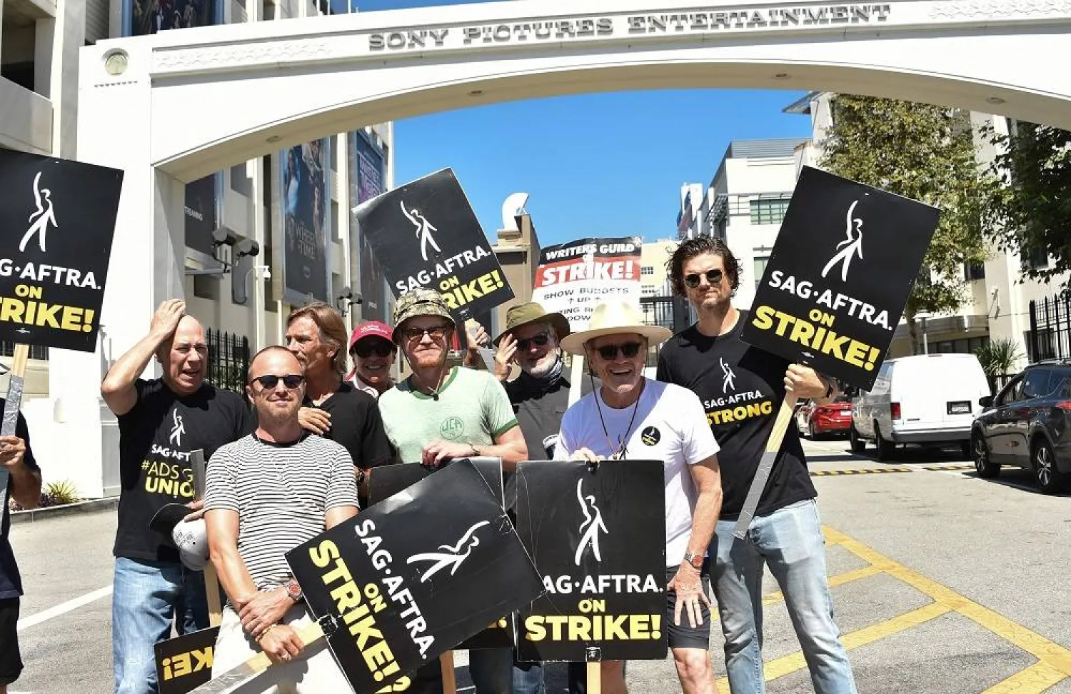 US actor Bryan Cranston, US actor Aaron Paul, US actress Betsy Brandt, US actor Jesse Plemons, and US actor Matt Jones, of "Breaking Bad," join the Screen Actors Guild (SAG-AFTRA) picket line in front of Sony Pictures Entertainment Studios in Culver City, California, on August 29, 2023. (AFP)