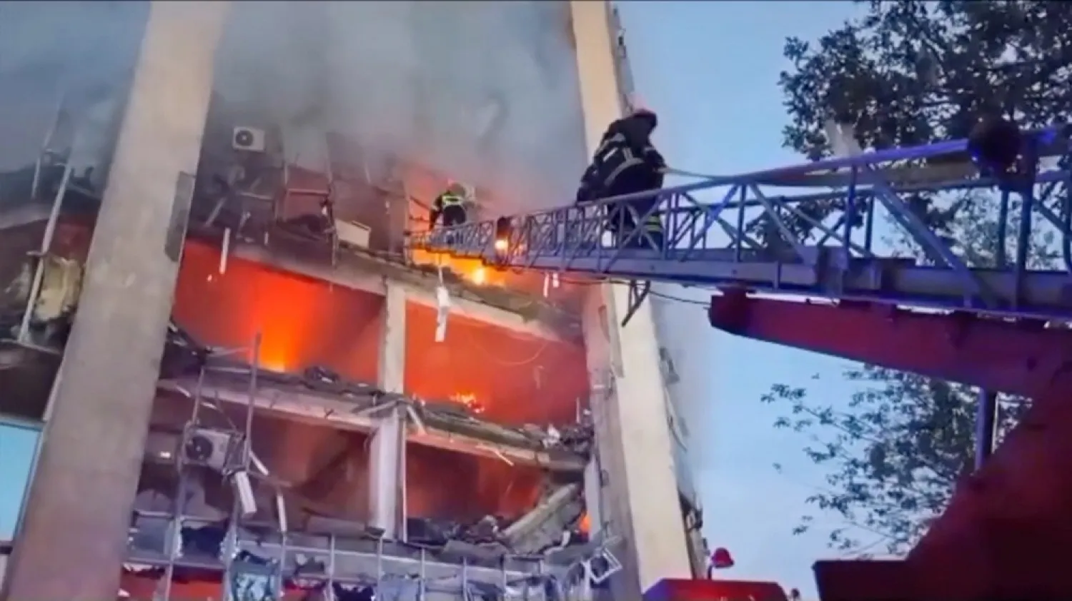 Firefighters work at a damaged property, following a Russian drone attack, amid Russia's attack on Ukraine, at Izmail, Odesa region, Ukraine, August 2, 2023, in this screen grab obtained from a handout video. (Ukraine's Operational Command 'South' /Handout via Reuters) 