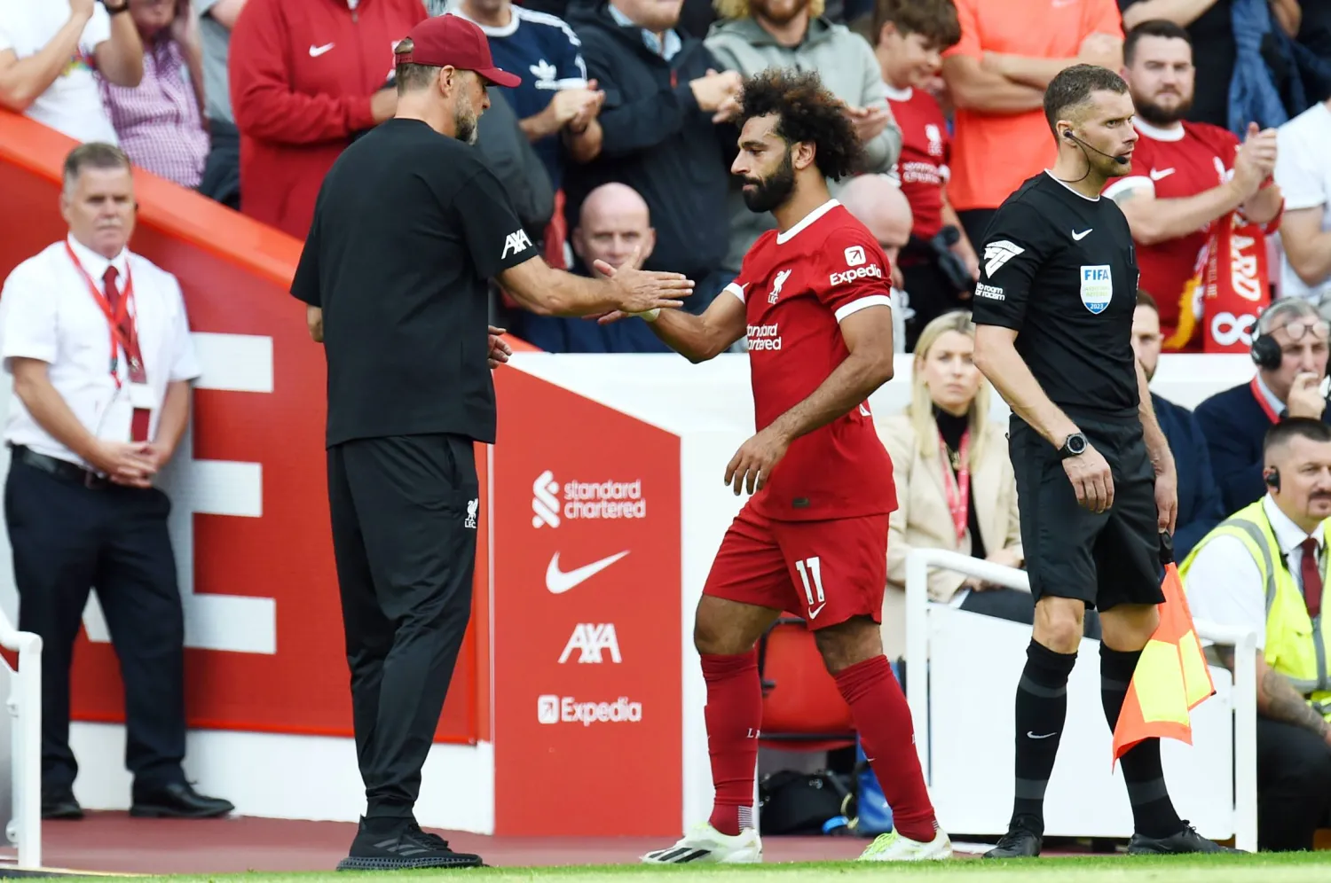 يورغن كلوب في لقطة مع محمد صلاح (إ.ب.أ)