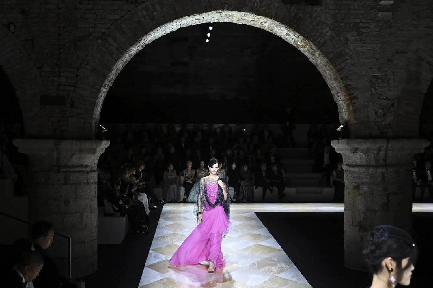 A model for Armani presents a creation during the "One Night Only Venice" fashion show coinciding with the 80th edition of the International Film Festival at the Venice Lido, Saturday, Sept. 2, 2023. (AP)