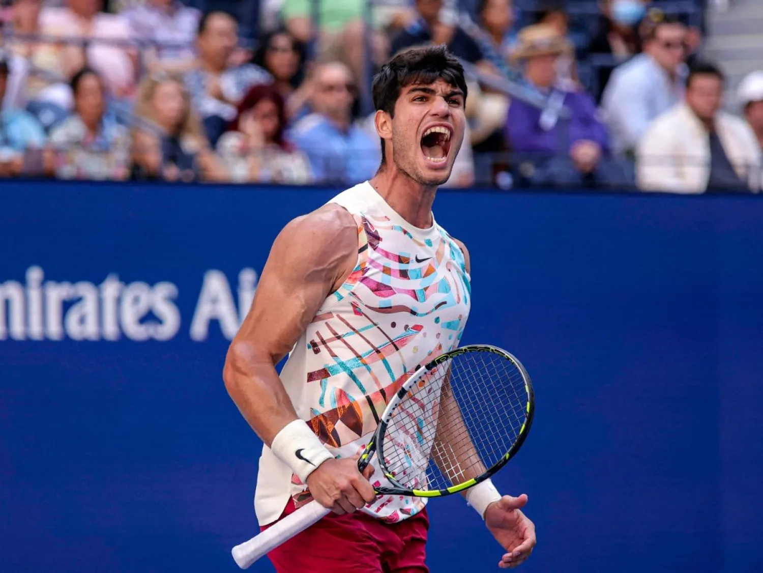 الكاراس يحتفل بالفوز على إيفانز (ا ف ب)