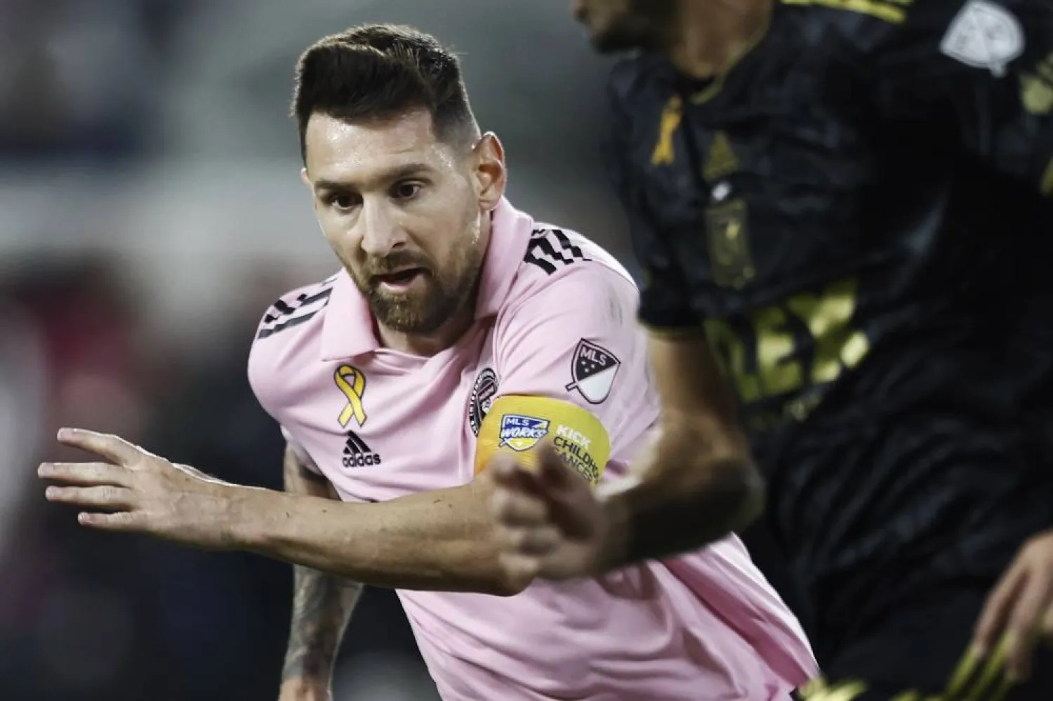 Lionel Messi (L) of Inter Miami FC in action against Giorgio Chiellini of LAFC during the match between LAFC and Inter Miami FC at BMO Stadium in Los Angeles, California, USA, 03 September 2023. (EPA) 
