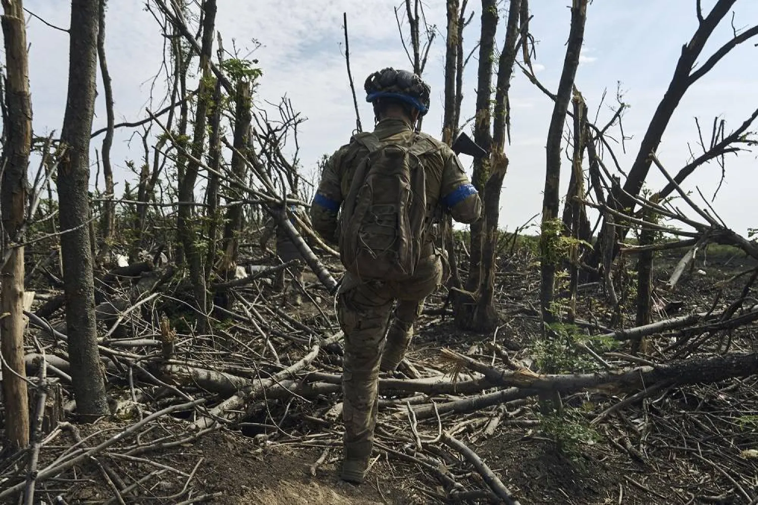 A soldier of Ukraine's 3rd Separate Assault Brigade goes on his position near Bakhmut, the site of fierce battles with the Russian forces in the Donetsk region, Ukraine, Monday, Sept. 4, 2023. (AP)
