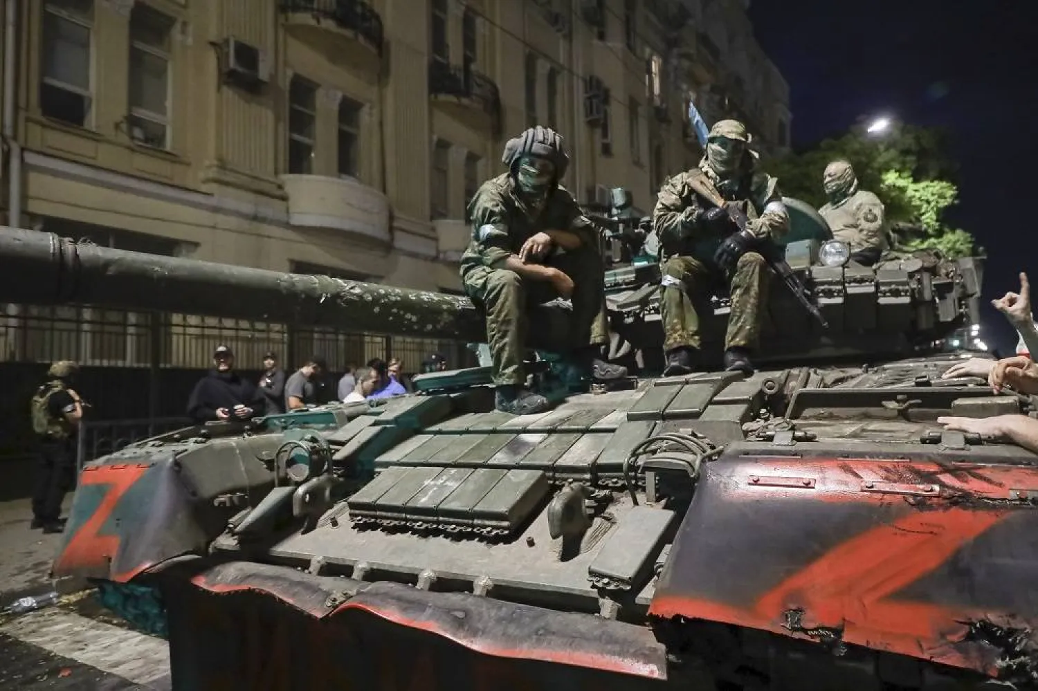 Members of the Wagner Group military company sit atop of a tank on a street in Rostov-on-Don, Russia, Saturday, June 24, 2023, prior to leaving an area at the headquarters of the Southern Military District. (AP) 