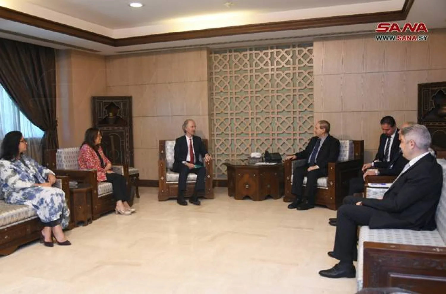 المقداد مستقبلاً بيدرسون في دمشق (سانا)