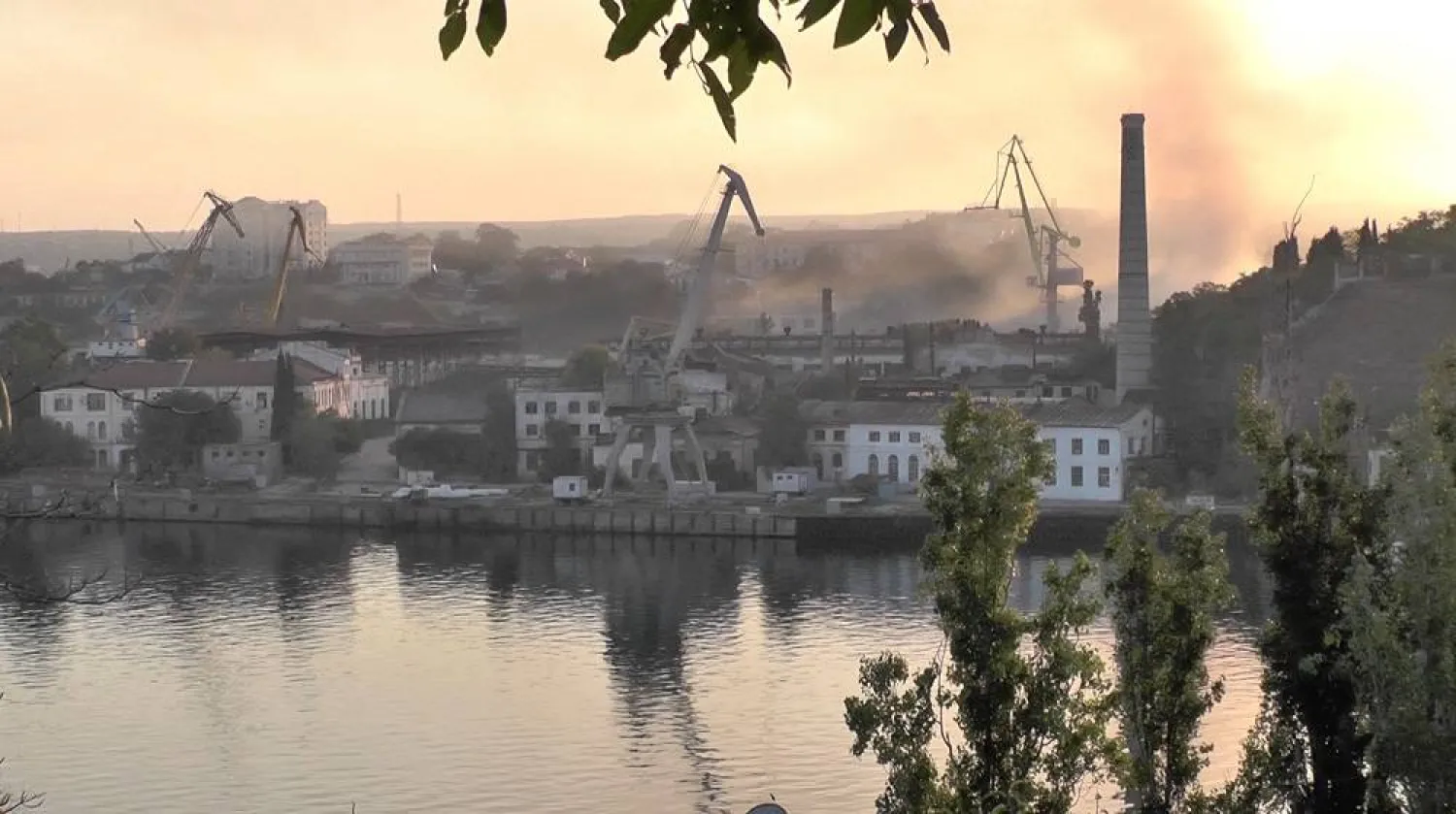  Smoke rises from the shipyard that was reportedly hit by Ukrainian missile attack in Sevastopol, Crimea, in this still image from video taken September 13, 2023. (Reuters TV via Reuters)
