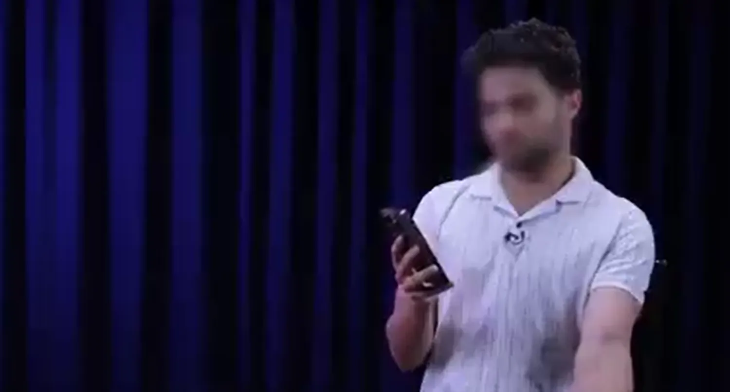 جانب من فيديو بثته وكالة ميزان التابعة للقضاء الإيراني من شخص قيل إنه شارك في تنظيم مظاهرات ببريطانيا