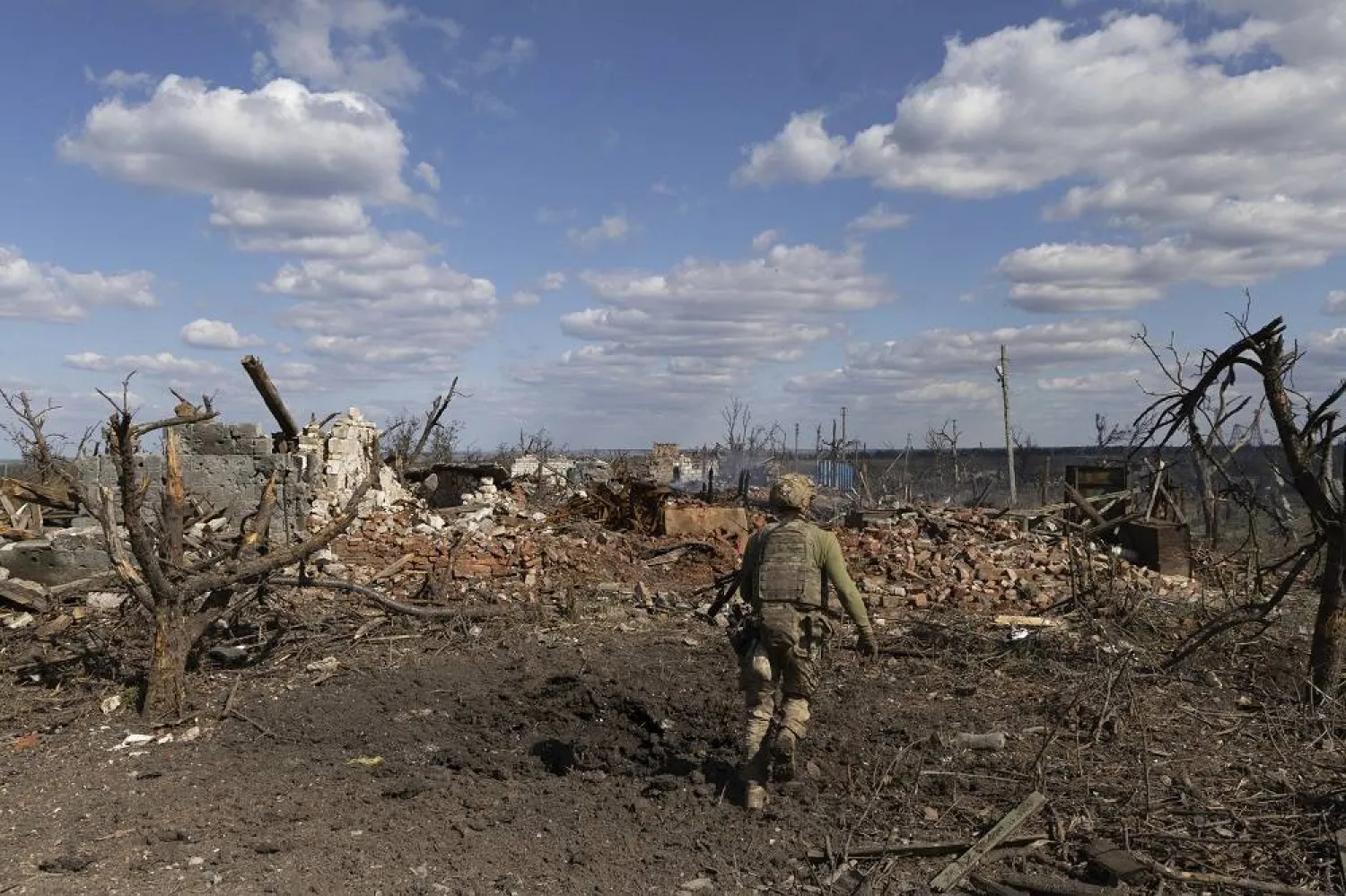 An assault unit commander from the 3rd Assault Brigade who goes by the call sign “Fedia”, runs to his position at the frontline in Andriivka, Donetsk region, Ukraine, Saturday, Sept. 16, 2023. (AP) 