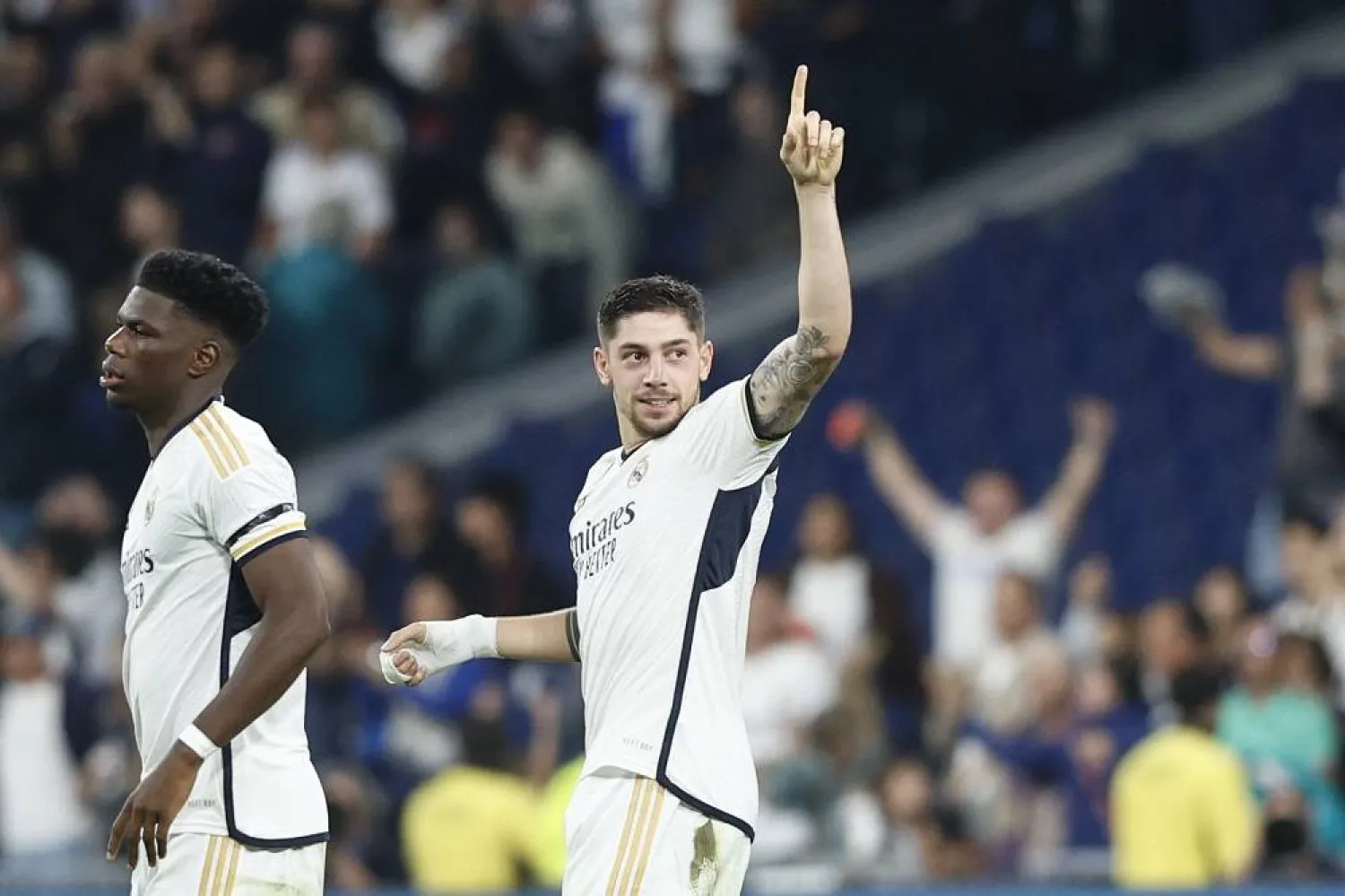 Real Madrid's Uruguayan midfielder Fede Valverde celebrates after scoring the 1-1 goal during the Spanish LaLiga soccer match between Real Madrid and Real Sociedad, in Madrid, Spain, 17 September 2023. (EPA)