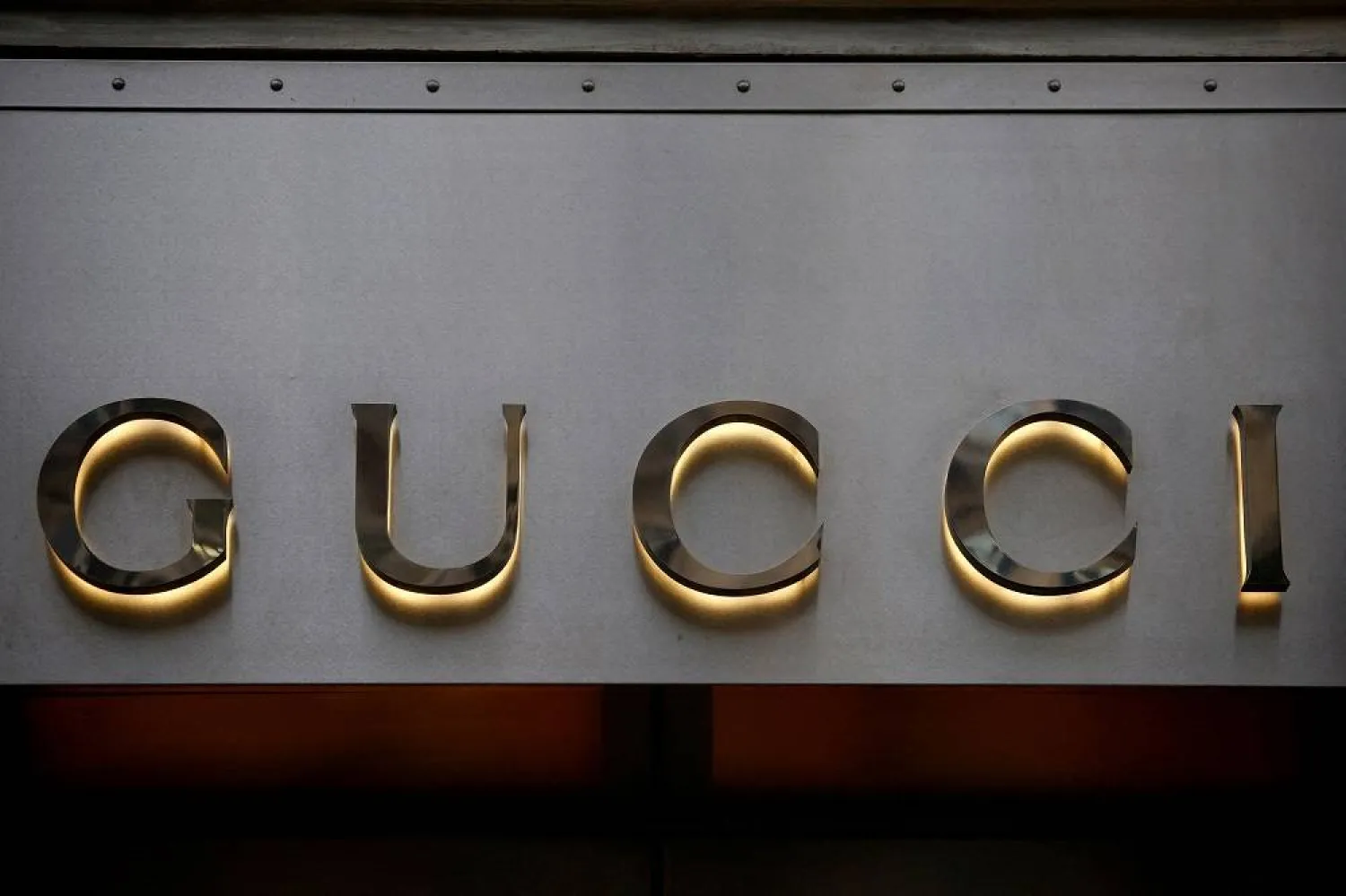 A Gucci sign is seen outside a shop in Paris, France, January 27, 2023. (Reuters)