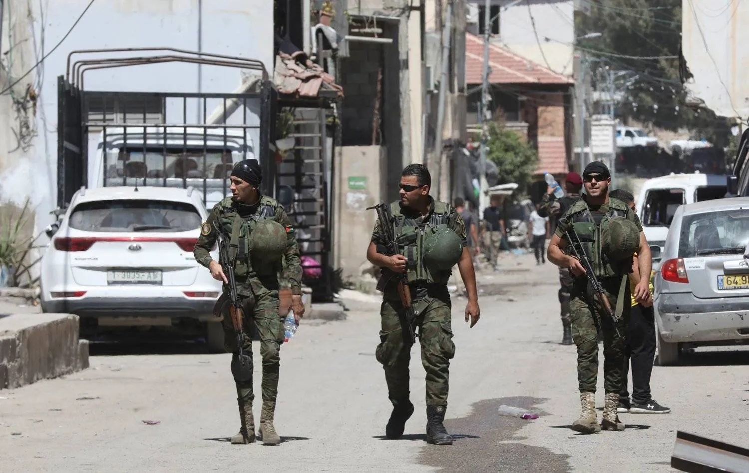 Palestinian security forces during a visit by President Mahmoud Abbas to the Jenin refugee camp on July 12. (AFP)
