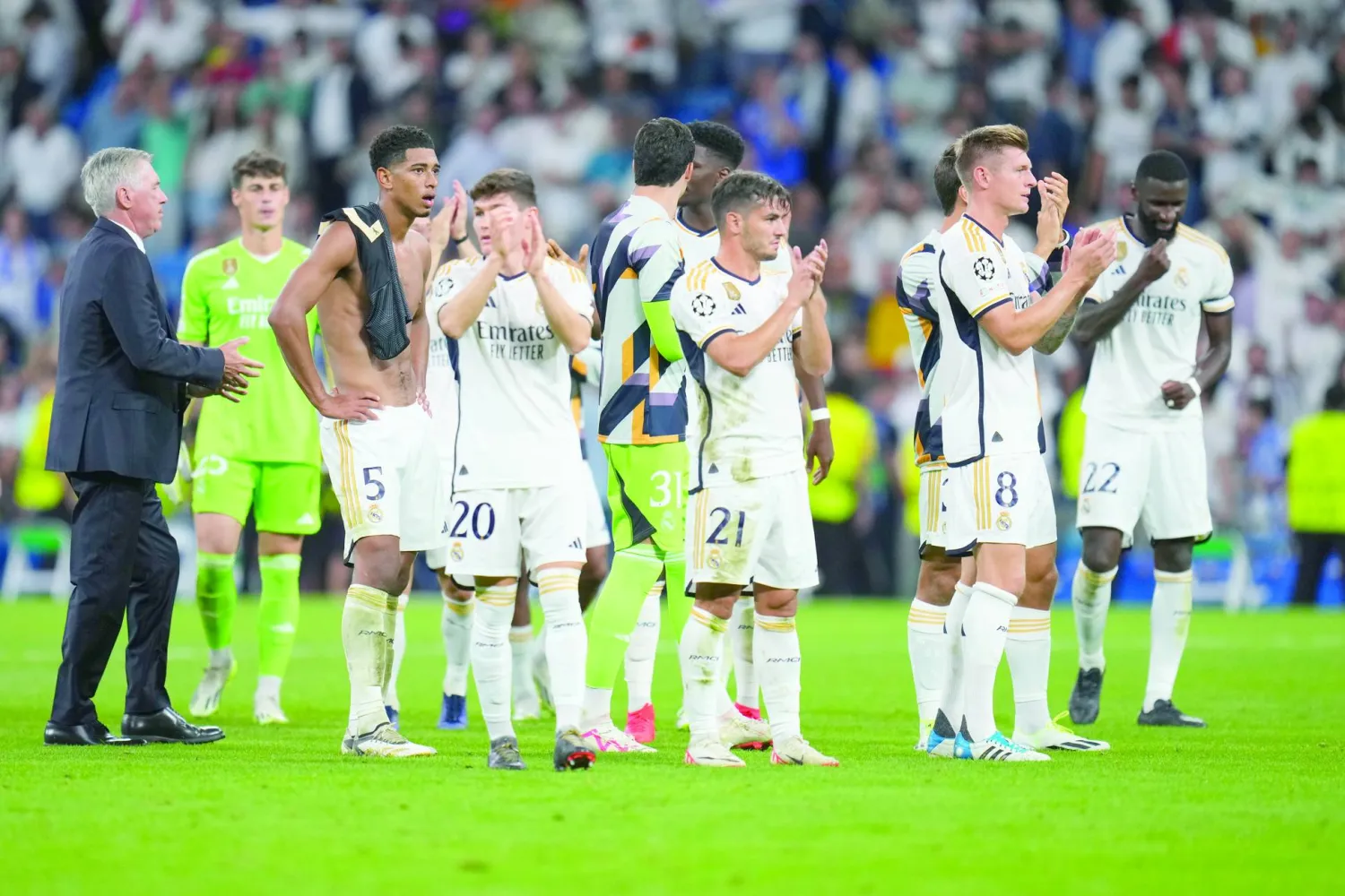 أنشيلوتي ولاعبوه وفرحة تخطي يونيون برلين في الجولة الأولى من دوري أبطال أوروبا (أ.ب)