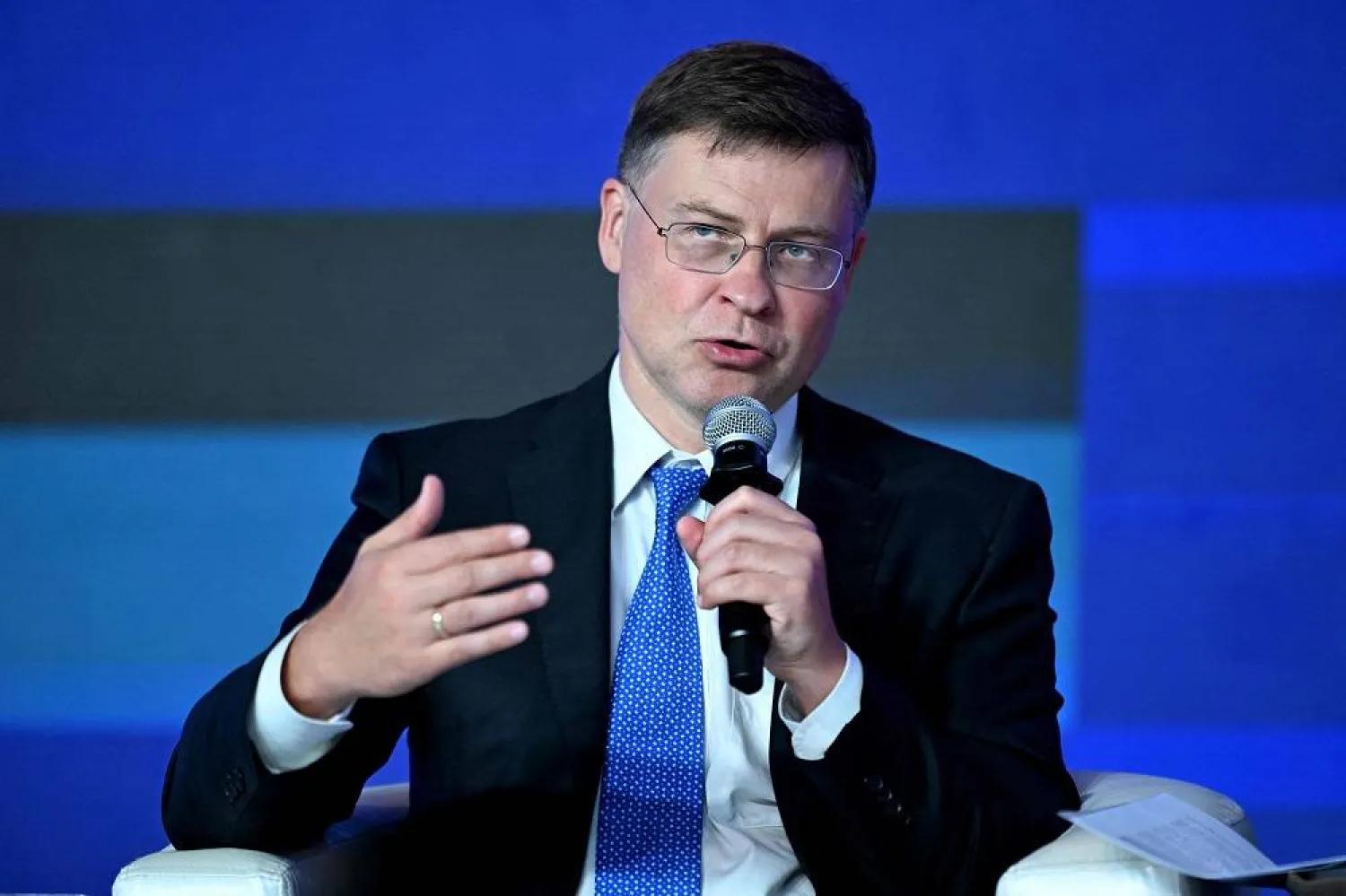  In this photograph taken on August 25, 2023, Valdis Dombrovskis, Executive Vice President & European Commissioner for Trade of The European Union, addresses the gathering on the first day of the three-day B20 Summit in New Delhi. (AFP)