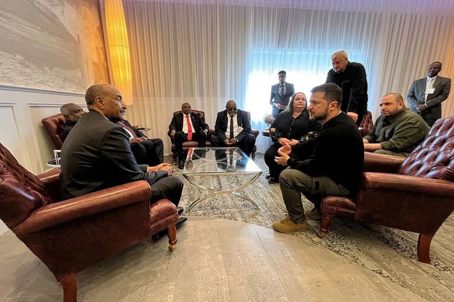 In this handout photograph taken and released by Ukrainian Presidential Press Service on September 23, 2023, Ukraine's President Volodymyr Zelenskiy (R) speaks with President of the Sudanese Sovereign Council, Abdel Fattah al-Burhan (L) during their meeting at Shannon Airport, in Shannon, western Ireland. (Handout / Ukrainian Presidential Press Service / AFP) 