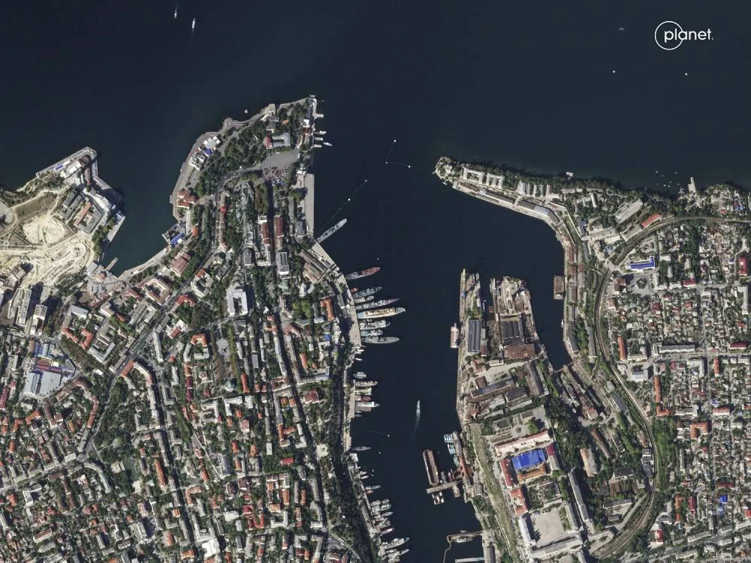  This satellite photo provided by Planet Labs shows the area surrounding the headquarters building for the Russian Black Sea fleet in Sevastopol, Crimea on Thursday, Sept. 21, 2023. The building was struck in a missile attack launched by the Ukrainian military on Friday. (Planet Labs via AP) 