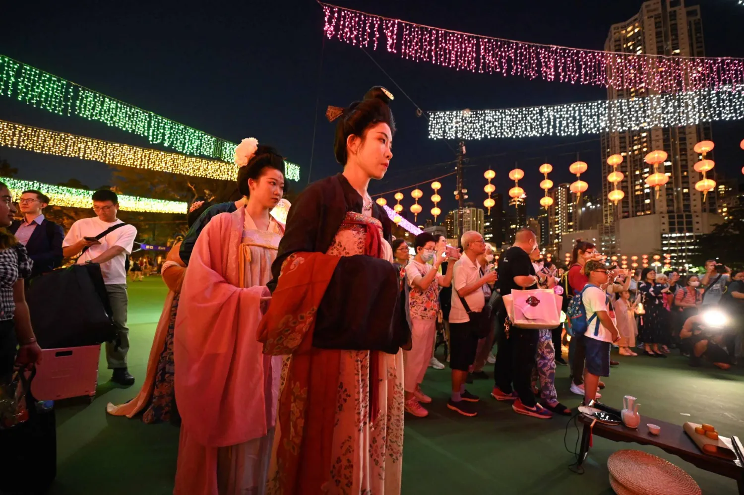 People visit a lantern display in Victoria Park in Hong Kong on September 29, 2023 to celebrate the Mid-Autumn festival. (Photo by Peter PARKS / AFP)