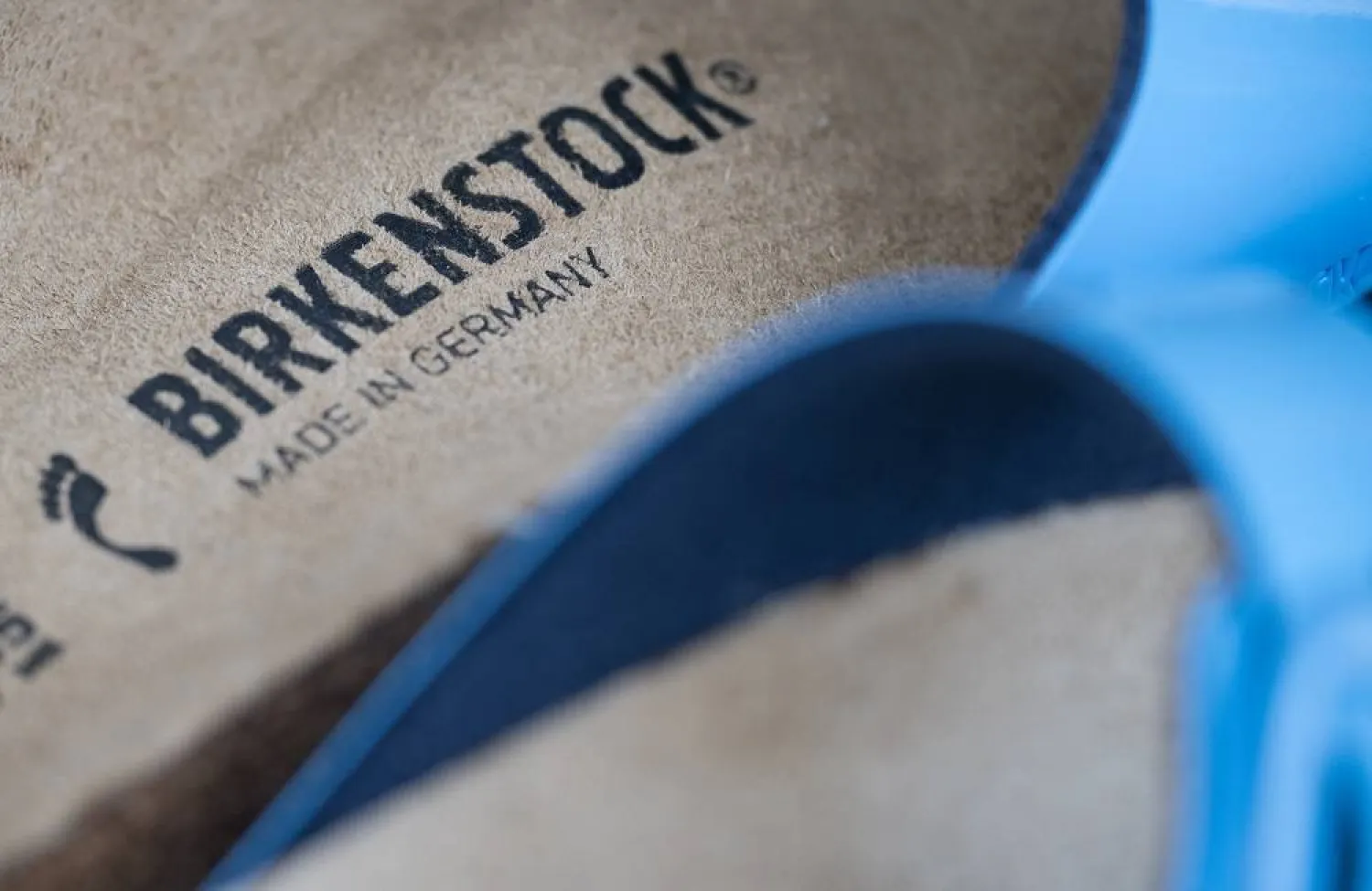 13 September 2023, Berlin: A view of Birkenstocks logo on a model of its product at a retail store. (dpa) 