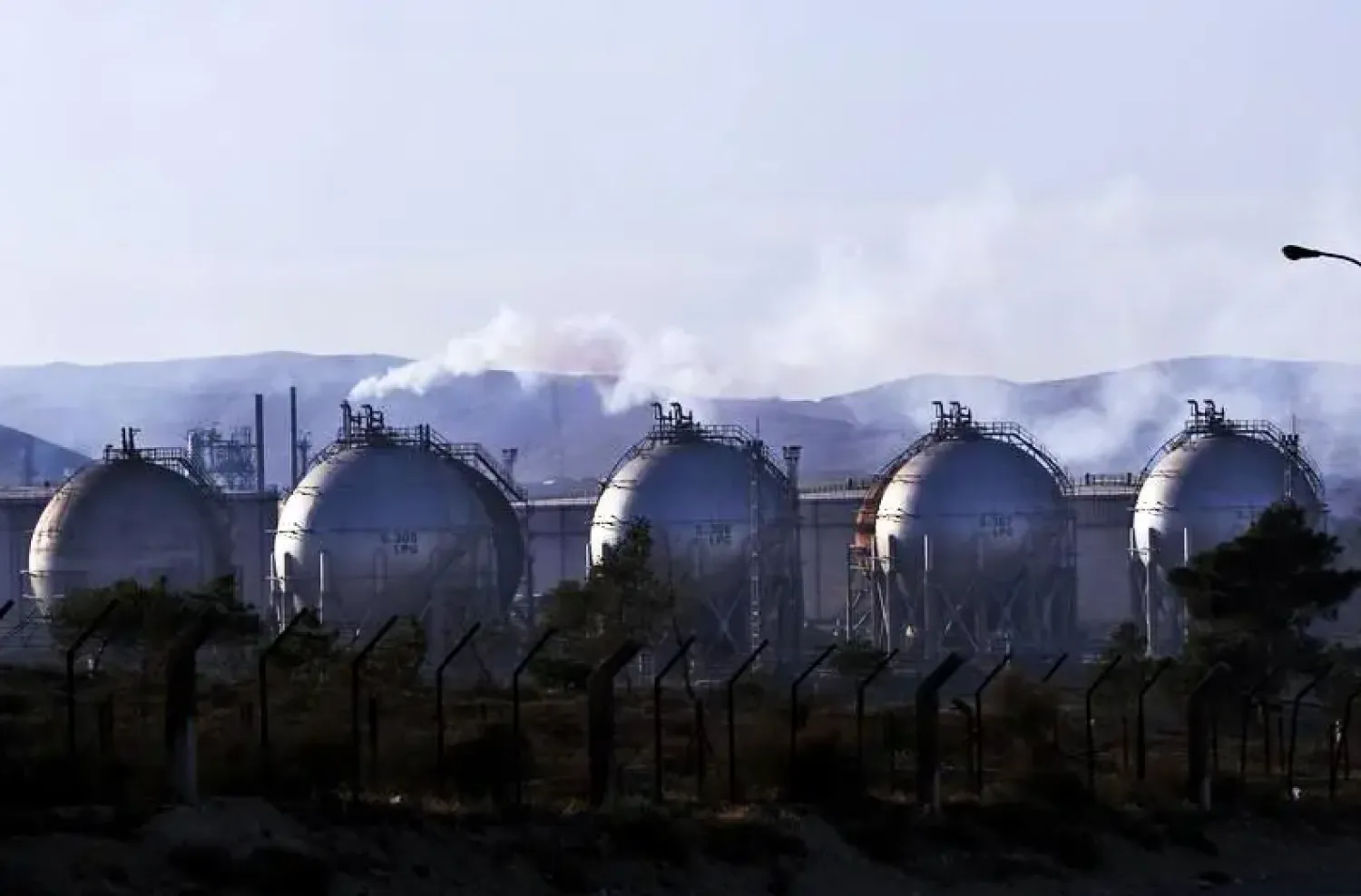 Spherical tanks are seen at the Jordan Petroleum Refinery in the city of Zarqa. (Reuters)  