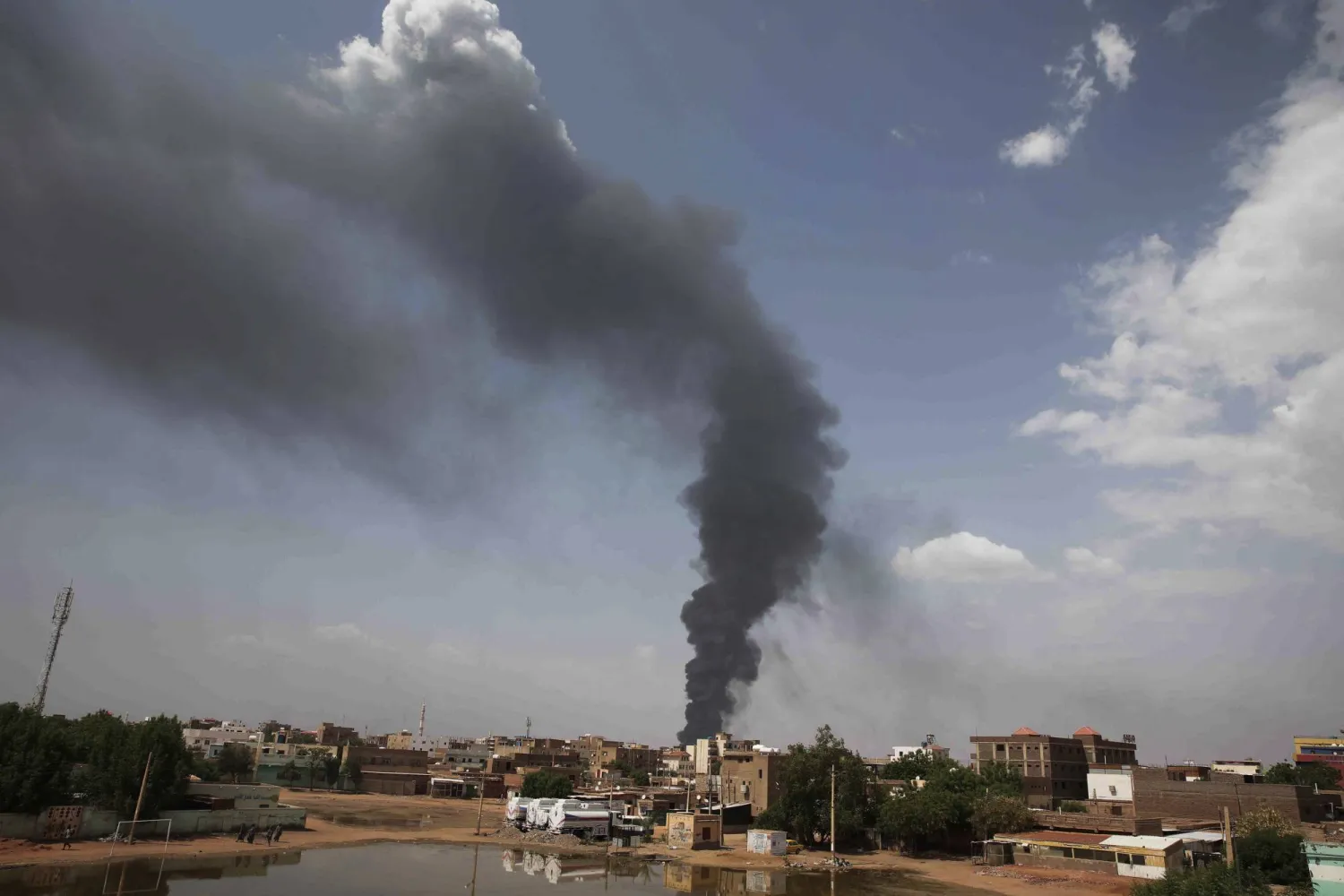 FILE - Smoke rises over Khartoum, Sudan, on June 8, 2023, as fighting between the Sudanese army and paramilitary Rapid Support Forces continues. (AP Photo, File)