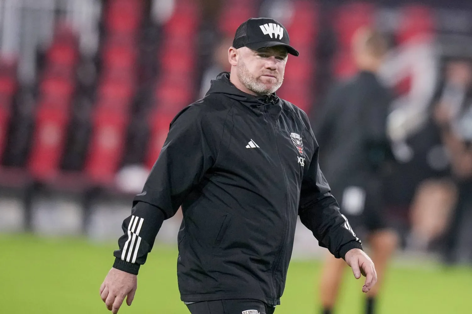FILE - D.C. United head coach Wayne Rooney walks off the field after the team's MLS soccer match against Inter Miami, July 8, 2023, in Washington. (AP Photo/Alex Brandon, File)