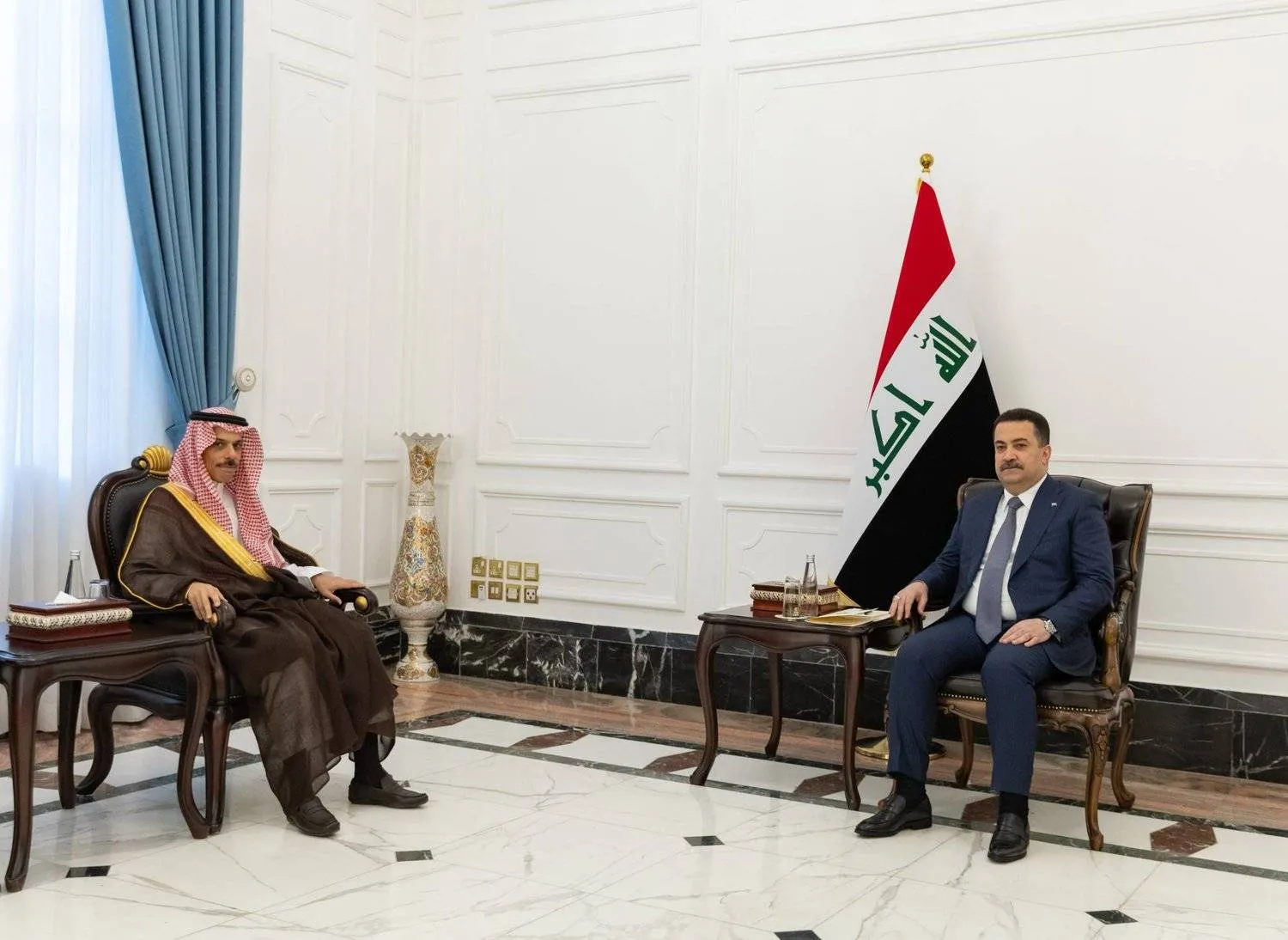 Iraqi Prime Minister Mohammed Shia al-Sudani receives Saudi Foreign Minister Prince Faisal bin Farhan bin Abdullah in Baghdad on Monday. (SPA)