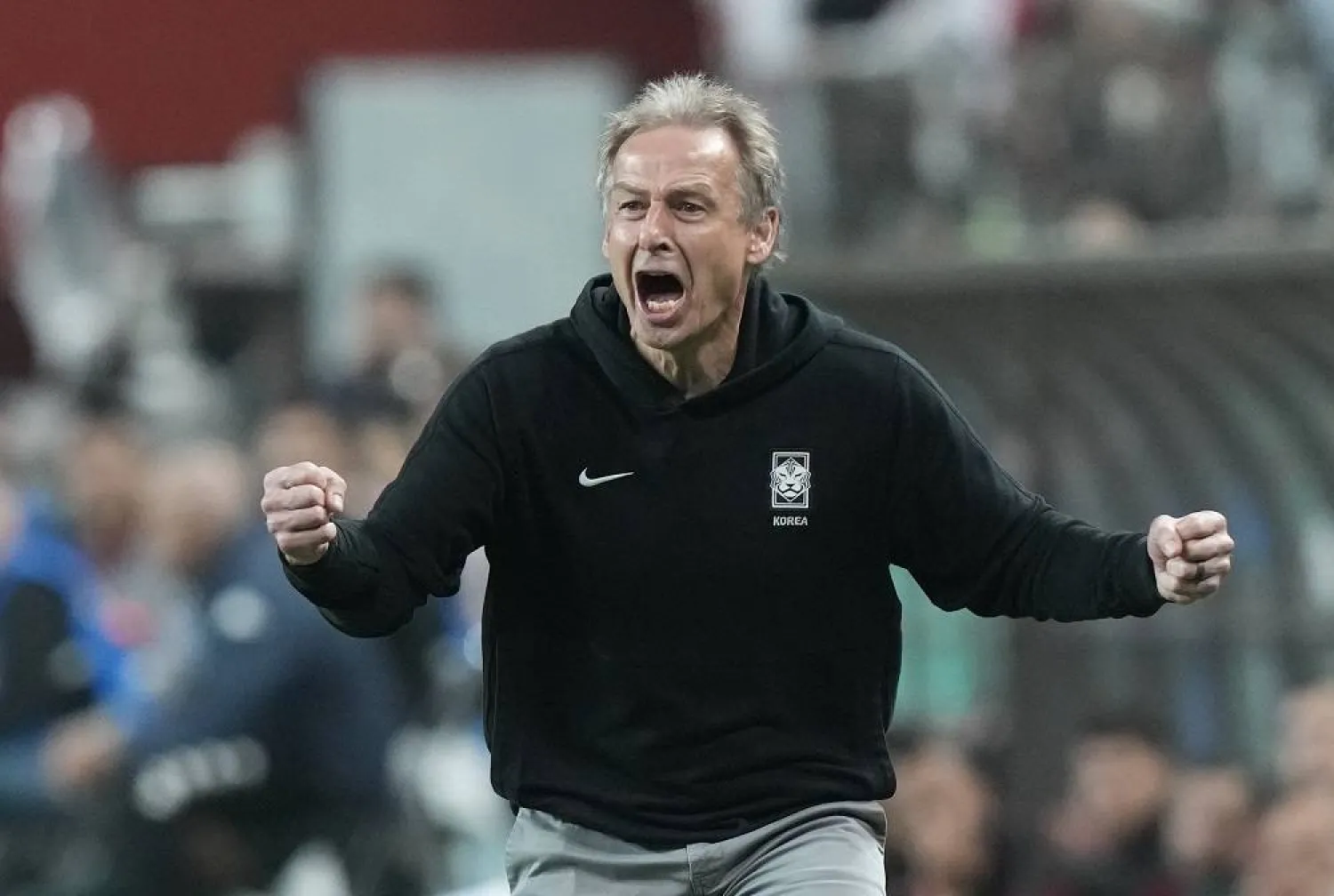 South Korea's head coach Jurgen Klinsmann celebrates after South Korea's Hwang Ui-jo scored a goal during an international friendly soccer match between South Korea and Tunisia in Seoul, South Korea, Friday, Oct. 13, 2023. (AP)