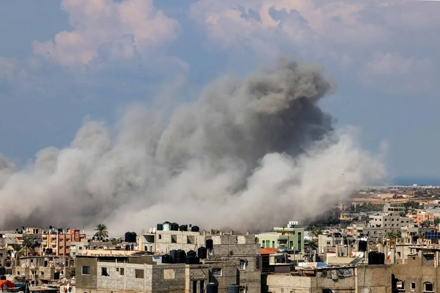 Smoke billows after an Israeli air strike in Rafah in the southern Gaza Strip on October 16, 2023. (AFP)
