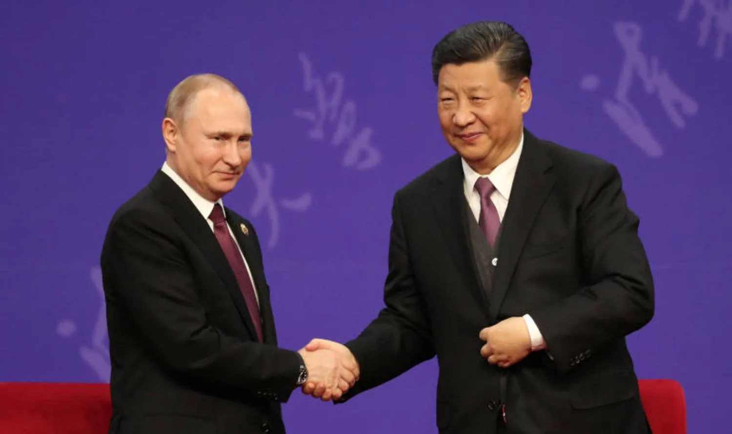 فلاديمير بوتين وشي جينبينغ (رويترز)