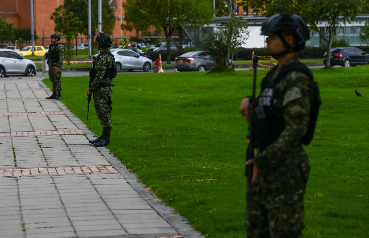 Members of the Colombian army stand guard near the US embassy in Bogota on October 18, 2023. The Israeli and US embassies in Colombia received bomb threats, police sources said Wednesday. (Photo by Juan BARRETO / AFP)