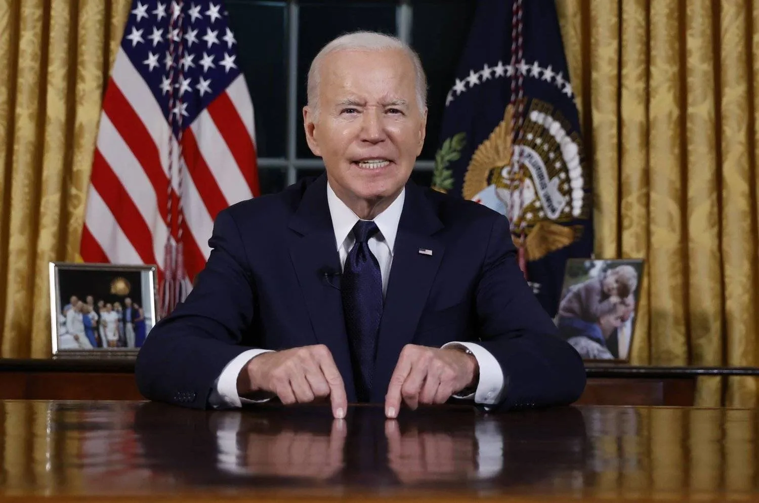 US President Joe Biden delivers a prime-time address to the nation from the Oval Office of the White House in Washington, USA, 19 October 2023. EPA/JONATHAN ERNST / POOL