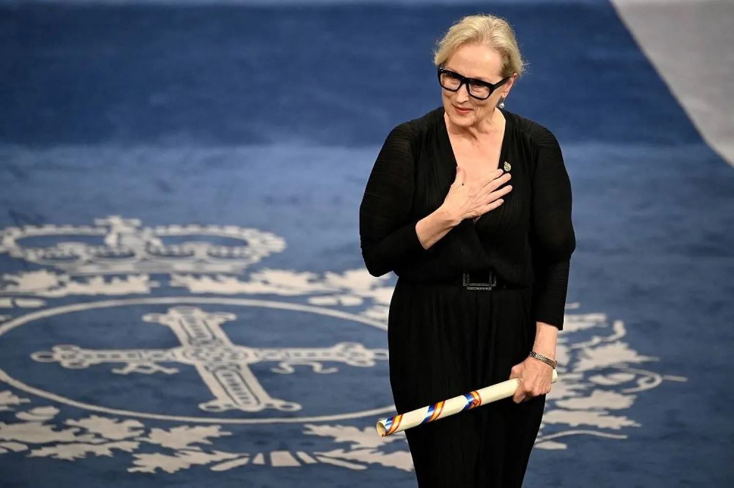  US actress Meryl Streep reacts on stage after receiving the 2023 Princess of Asturias Award for the Arts during the 2023 Princess of Asturias award ceremony at the Campoamor theatre in Oviedo on October 20, 2023. (AFP)