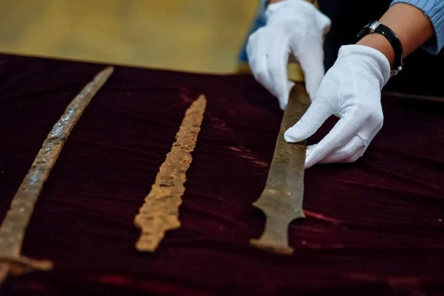 Employees of the Kyiv Pechersk Lavra National Reserve unpack returned antique Ukrainian artifacts, which were stolen by a Russian citizen and seized by the US Custom Service and Border Protection in New York, amid Russia's attack on Ukraine, in Kyiv, Ukraine, October 20, 2023. (Reuters) 