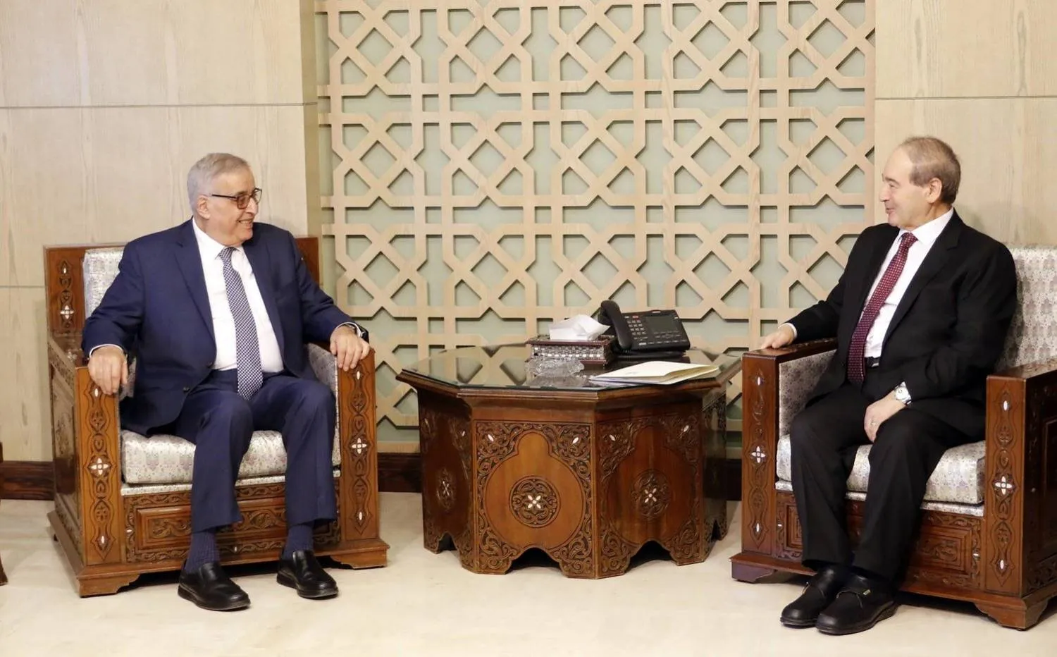 Syrian Foreign and Expatriates Minister Faysal Mikdad holds talks with his Lebanese counterpart Abdallah Bou Habib in Damascus on Monday. (EPA) 