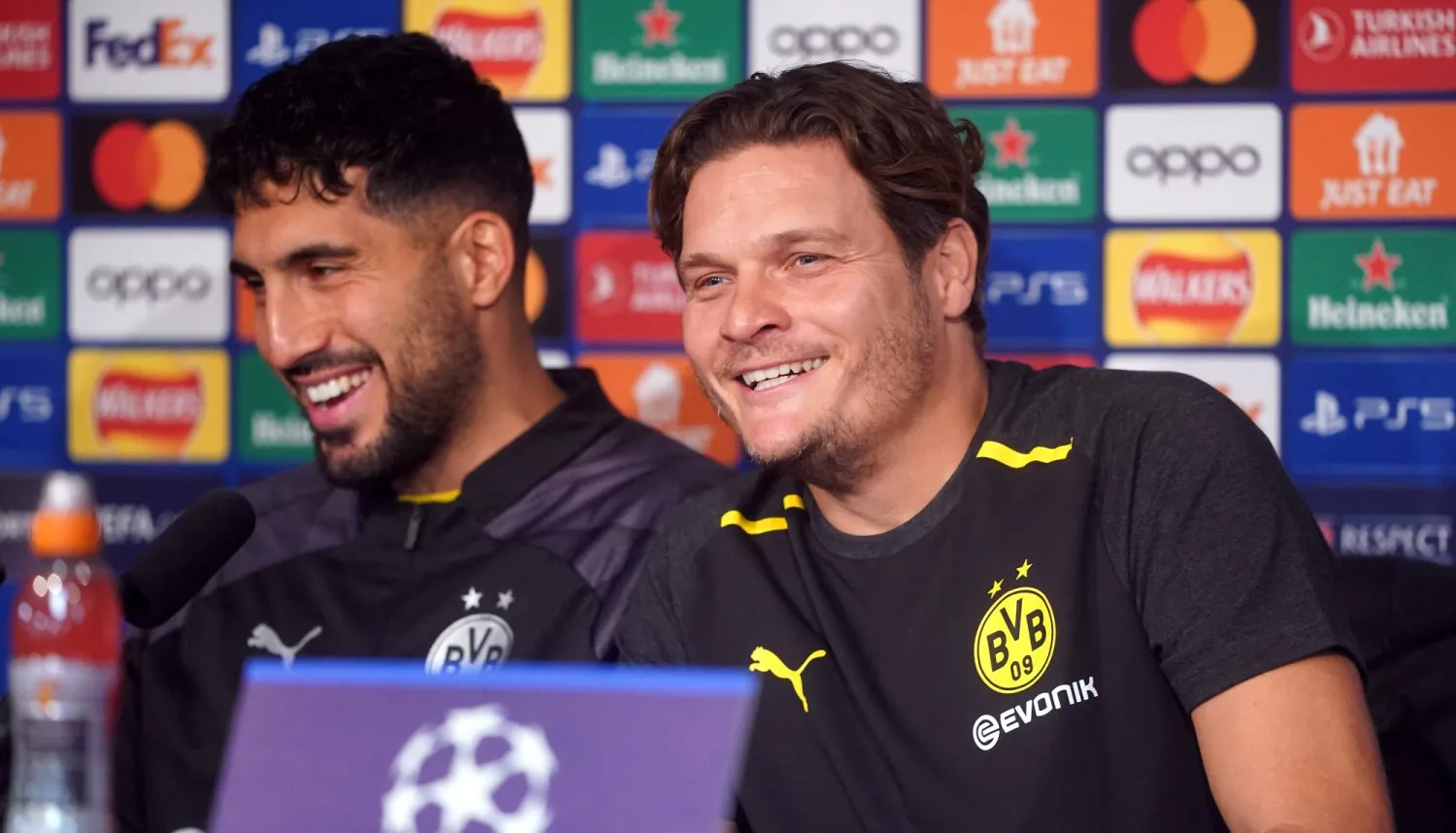 المدرب تيرزيتش واللاعب إيمري تشان خلال المؤتمر الصحافي (د.ب.أ)