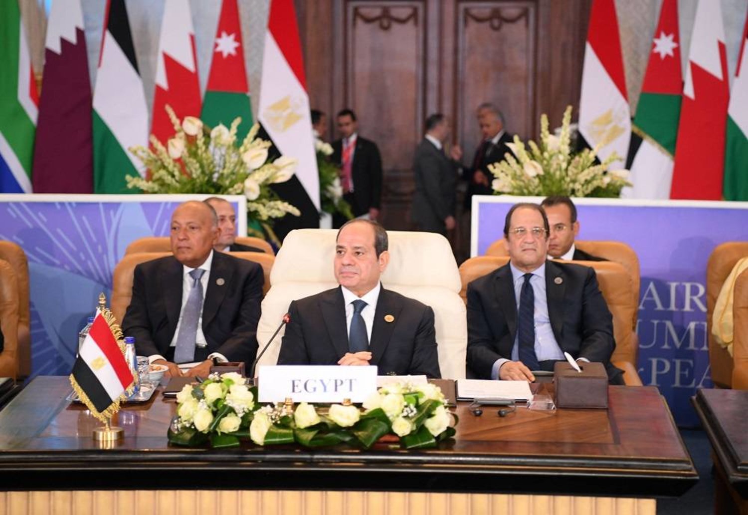 A handout photo made available by the Egyptian Presidential Office shows Egyptian President Abdel Fattah al-Sisi (C) attending the Cairo Peace Summit at the New Administrative Capital (NAC), some 45km east of Cairo, Egypt, 21 October 2023. (EPA /Egyptian Presidential Office / Handout) 